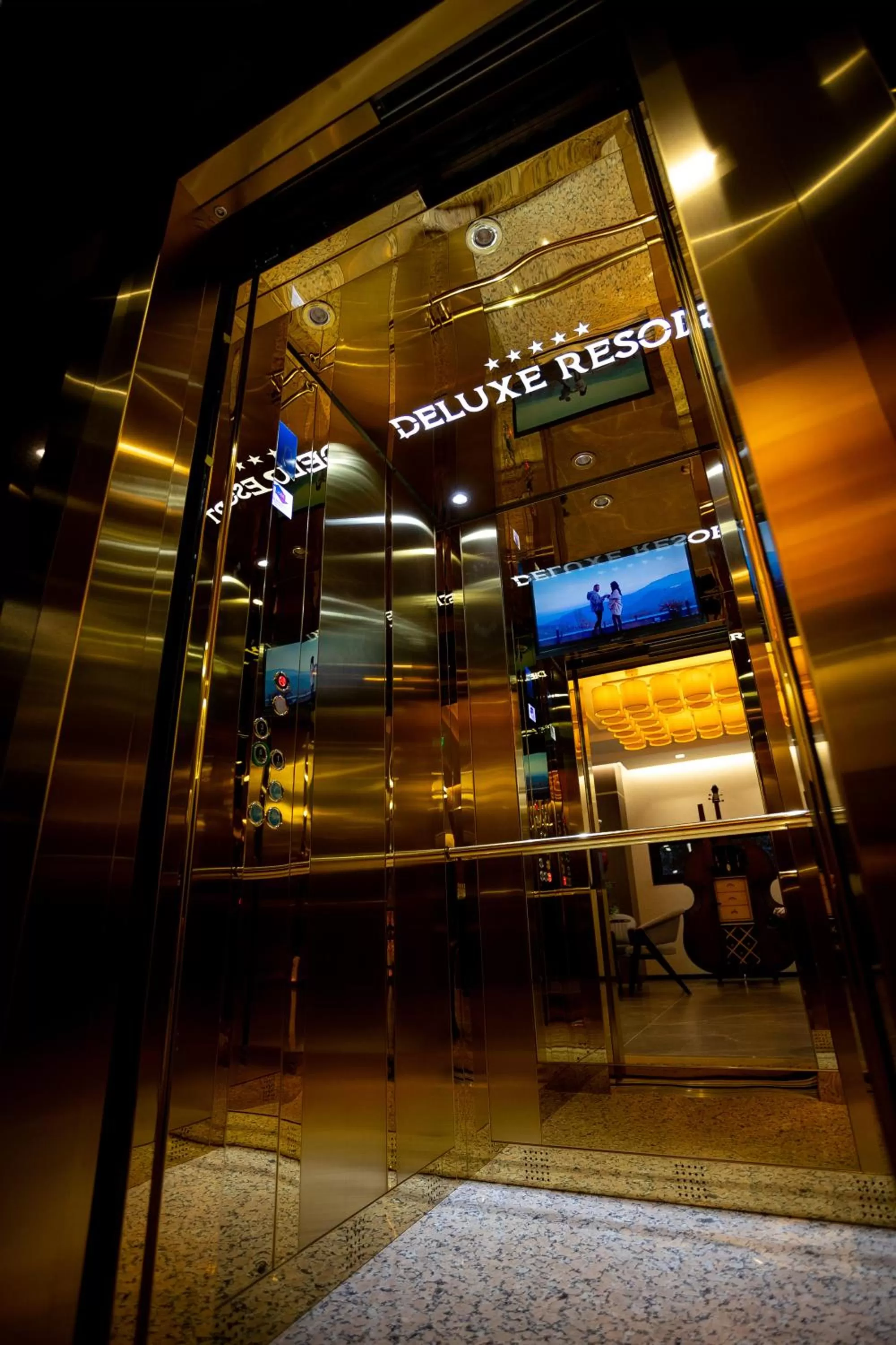 Property logo or sign in Deluxe Resort and SPA