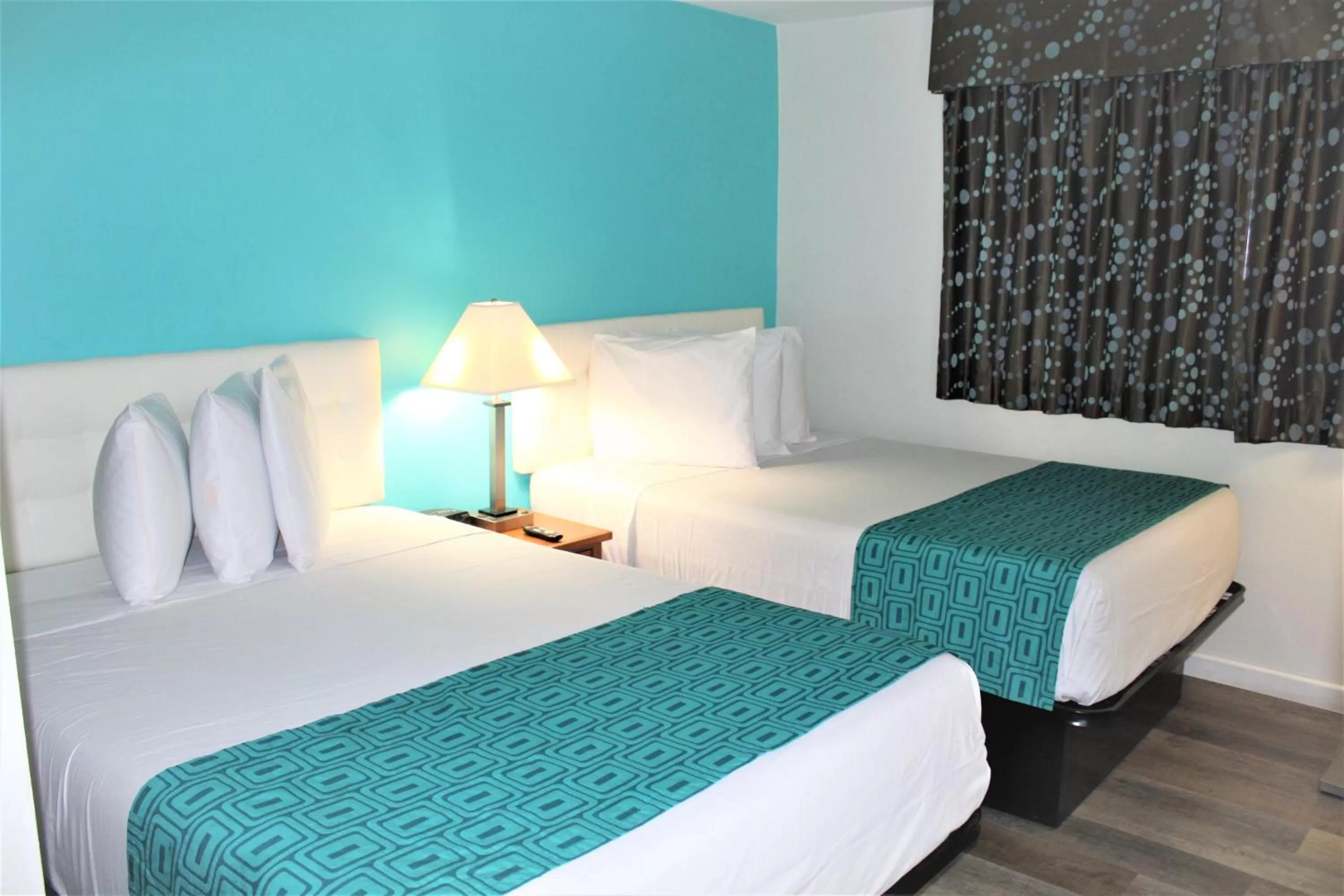 Bedroom, Bed in Howard Johnson Suites by Wyndham San Diego Chula Vista BayFront