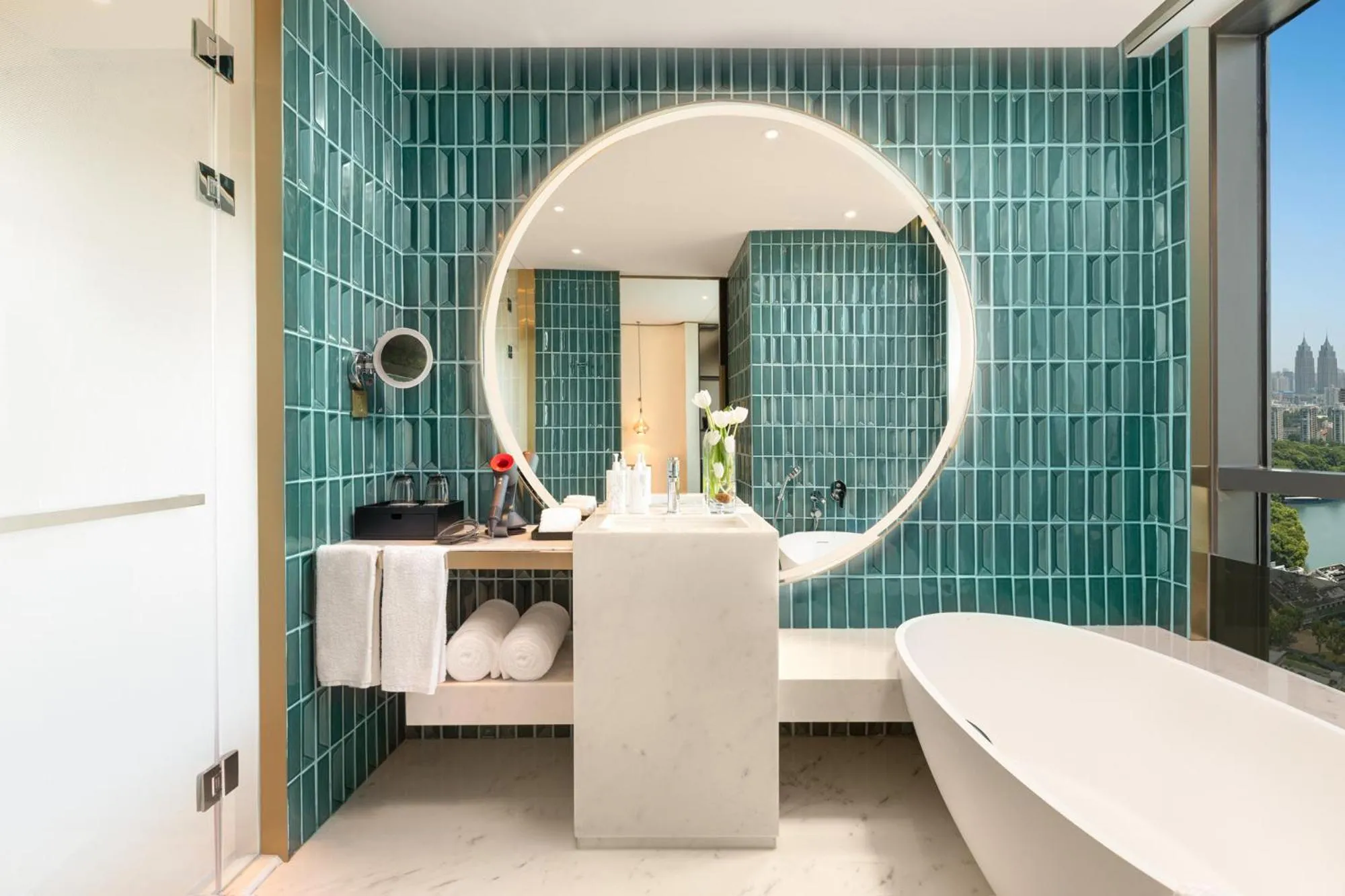 Bathroom in HUALUXE Shanghai Changfeng Park by IHG