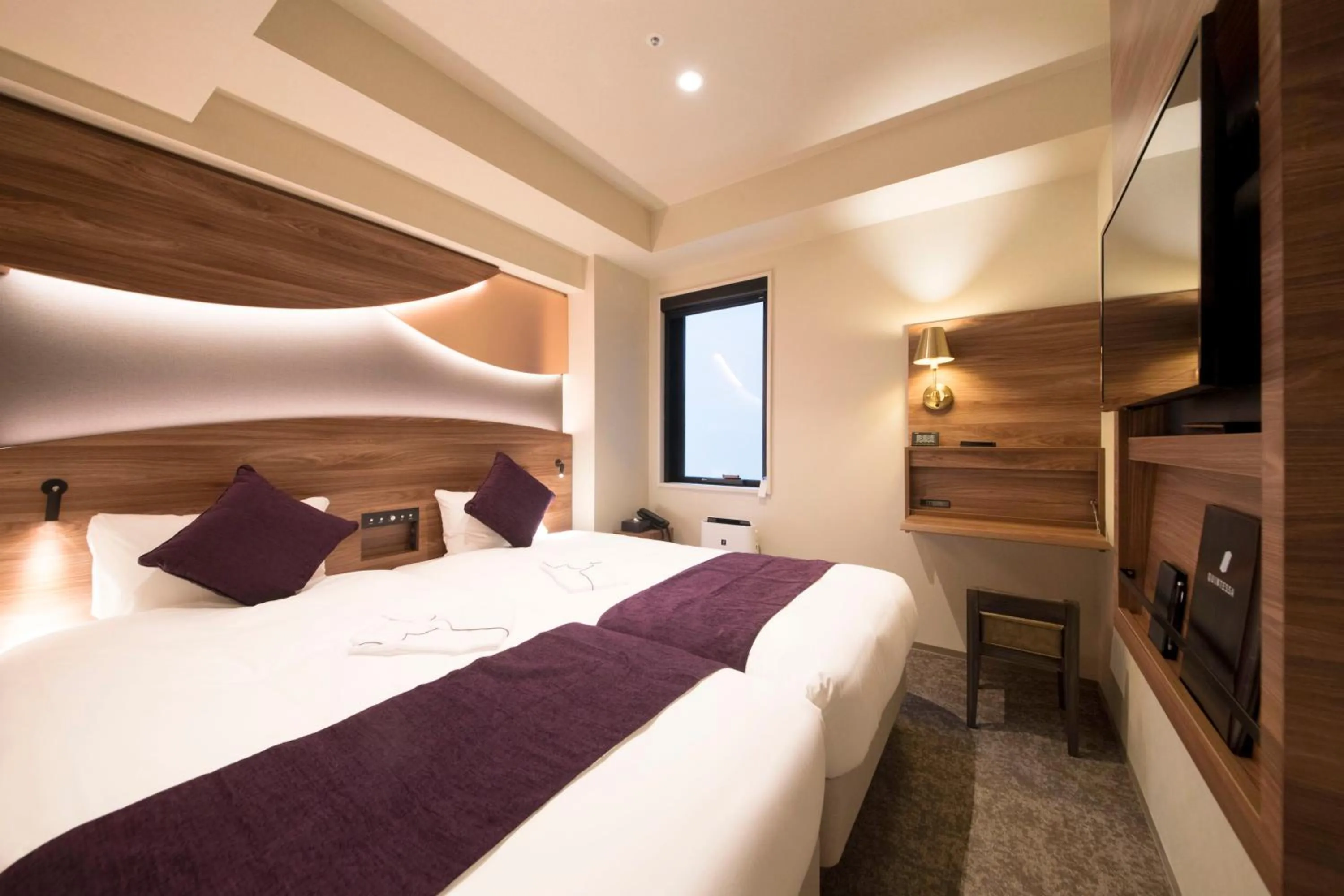 Bed in Quintessa Hotel Tokyo Ginza