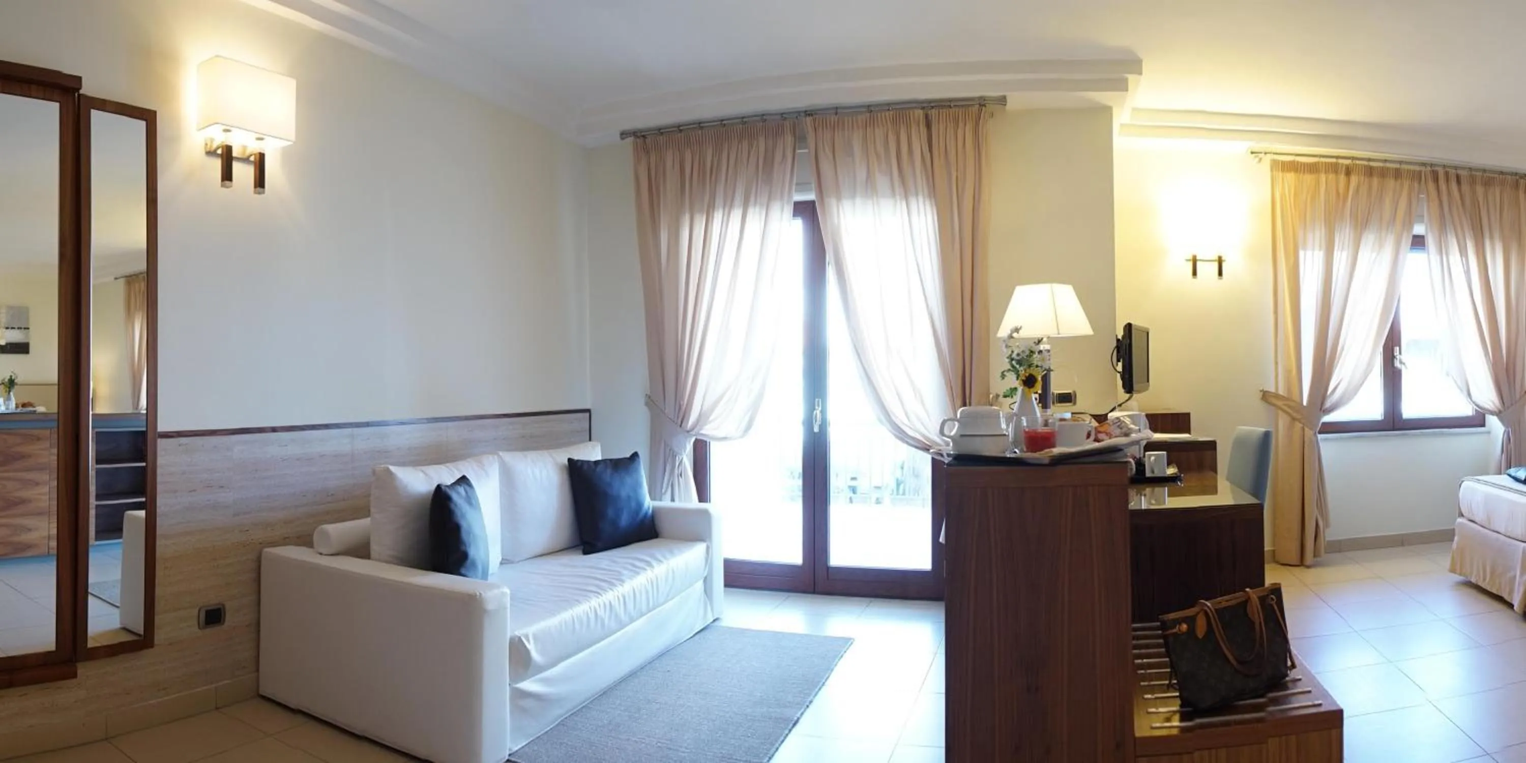 Photo of the whole room in Suites & Residence Hotel