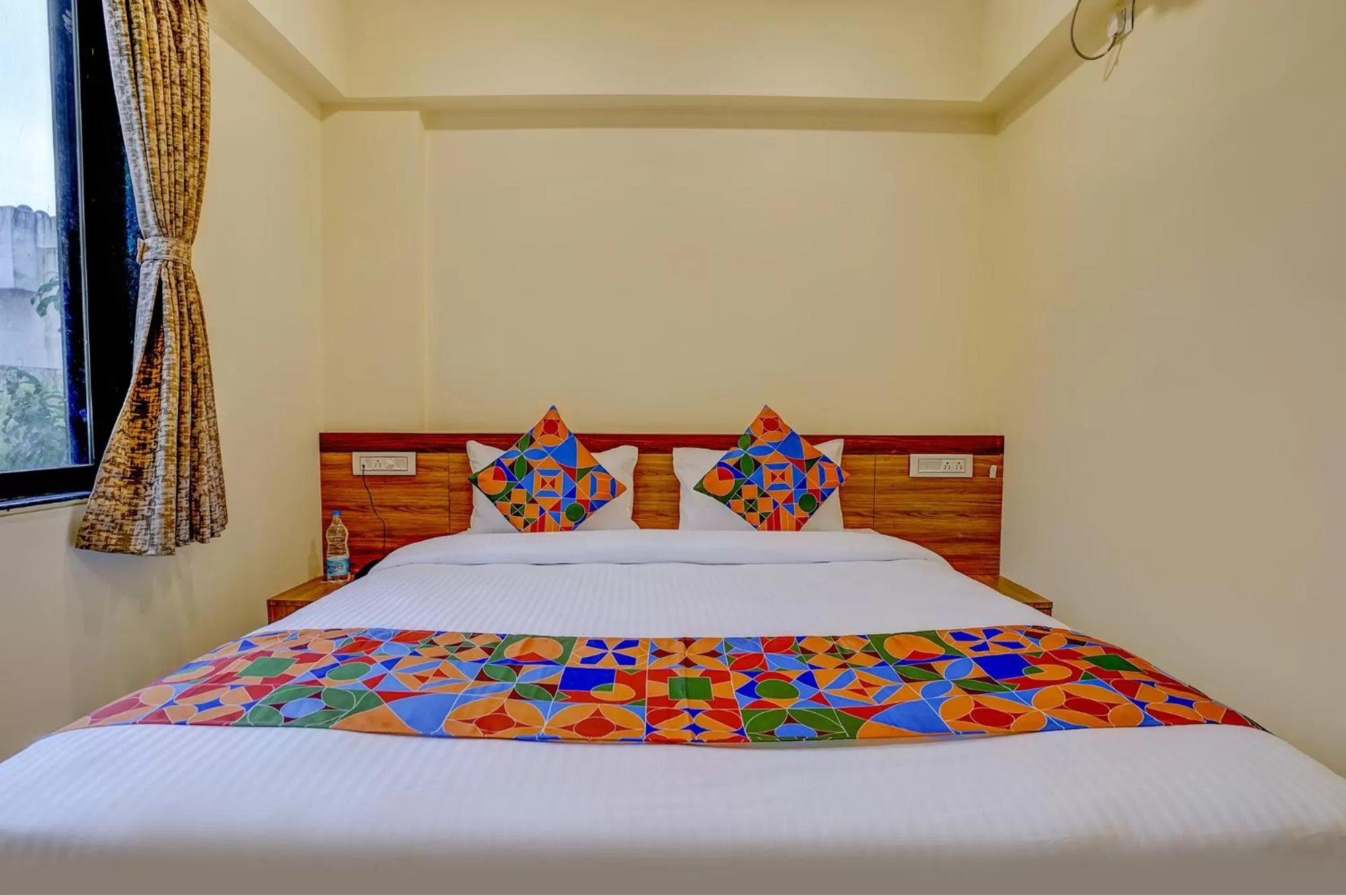Bed in FabHotel Crystal Homes - nr Rajaram Bhiku stadium
