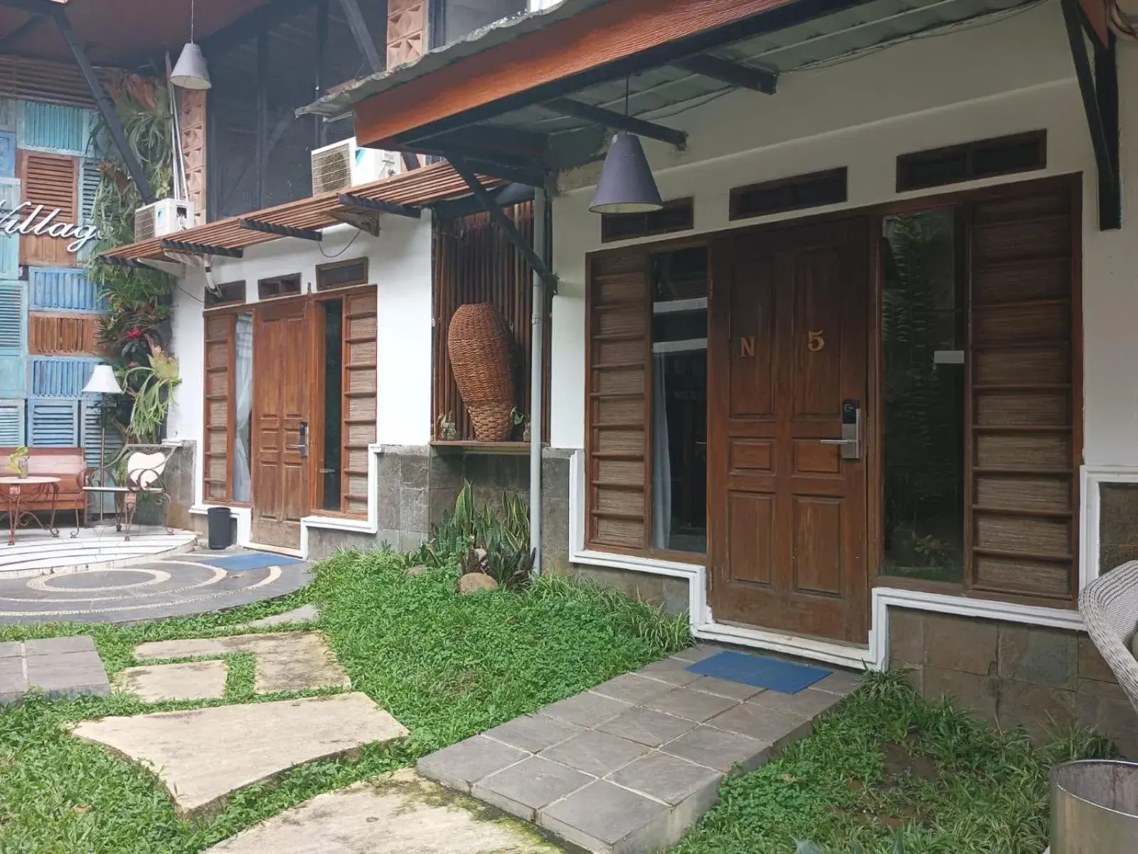 Executive Triple Room in The Village Resort Bogor Powered by Archipelago Executive Triple Room in The Village Resort Bogor Powered by Archipelago