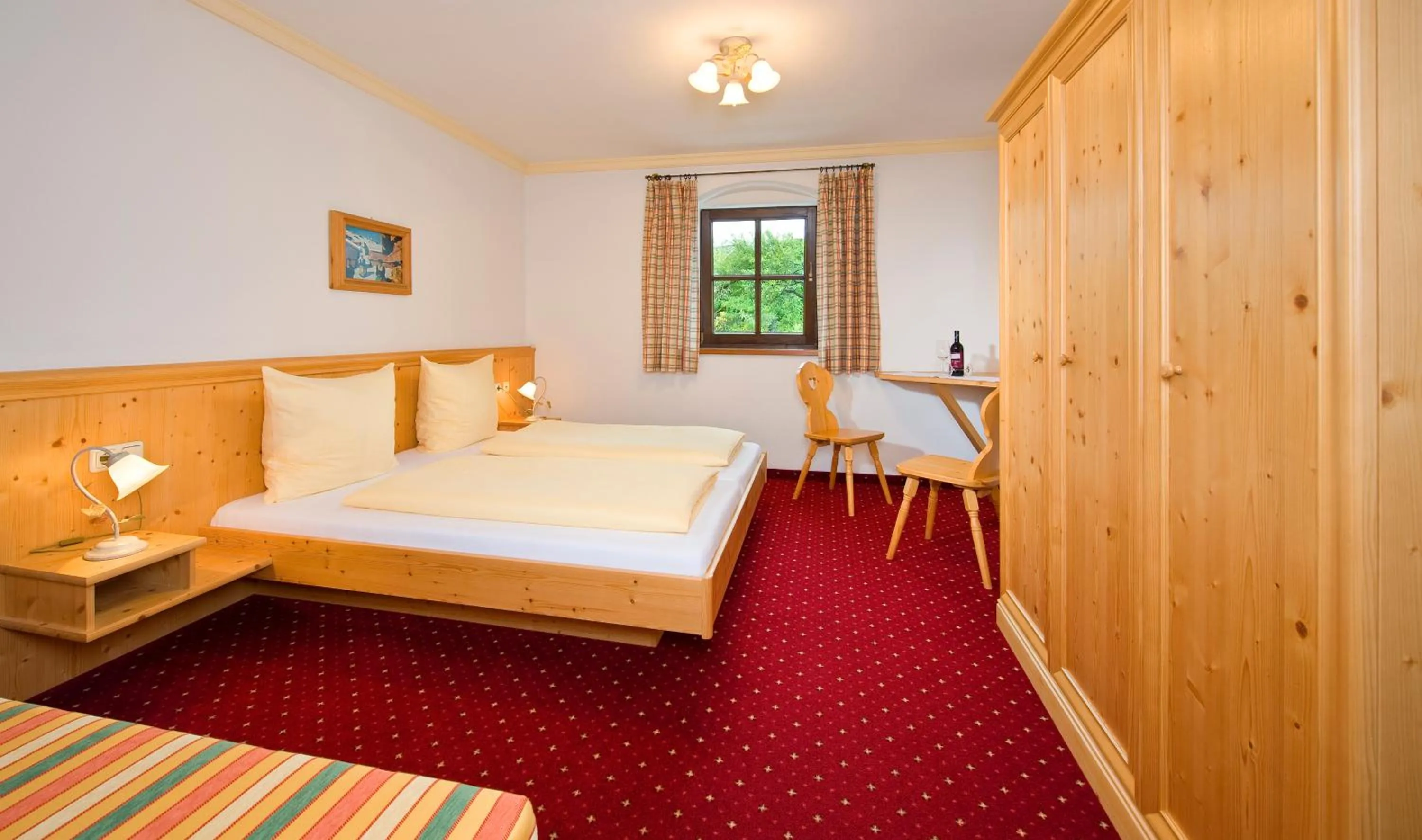 Photo of the whole room, Bed in Hotel Reitlwirt