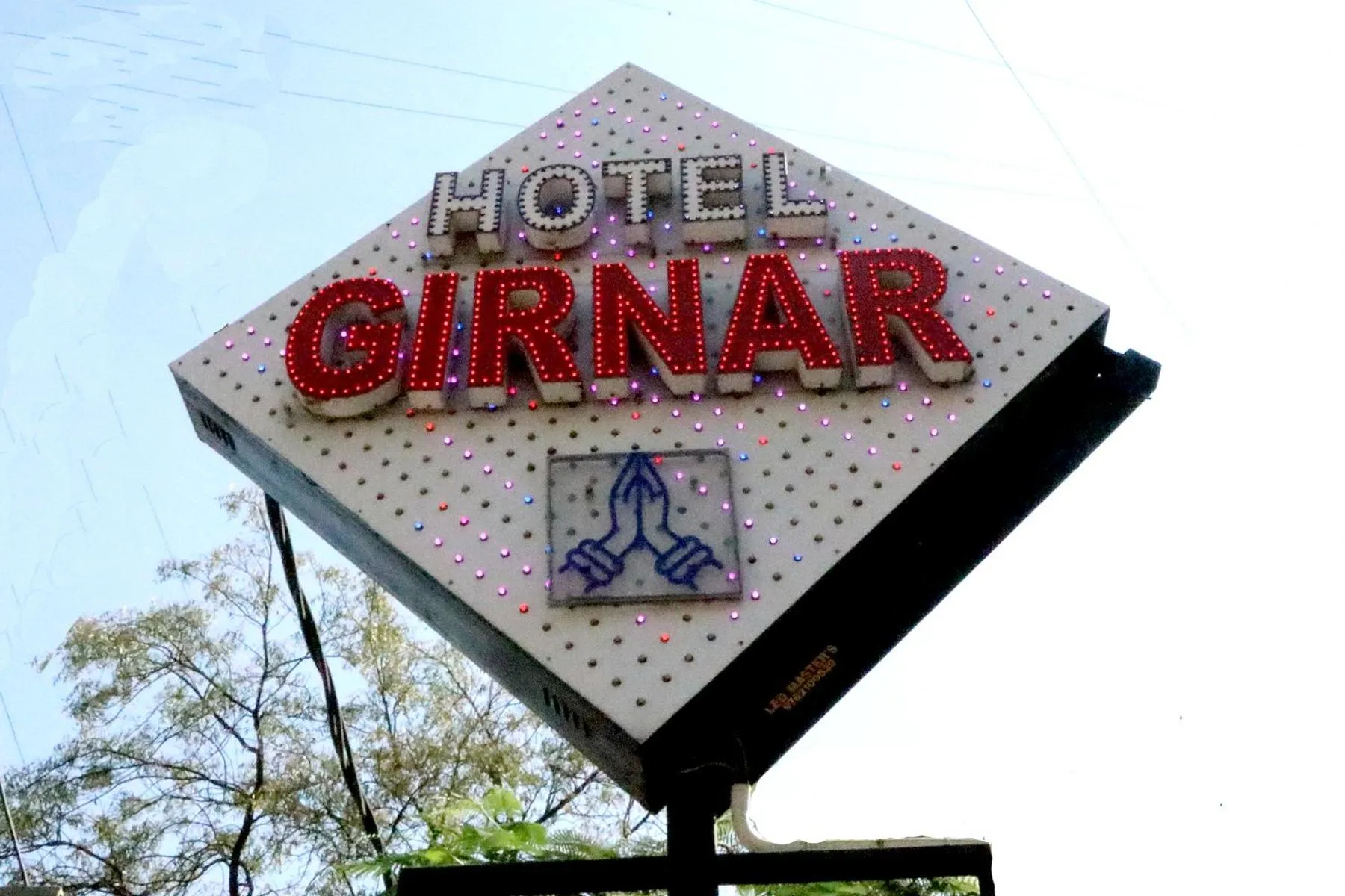 Property logo or sign in Hotel Girnar