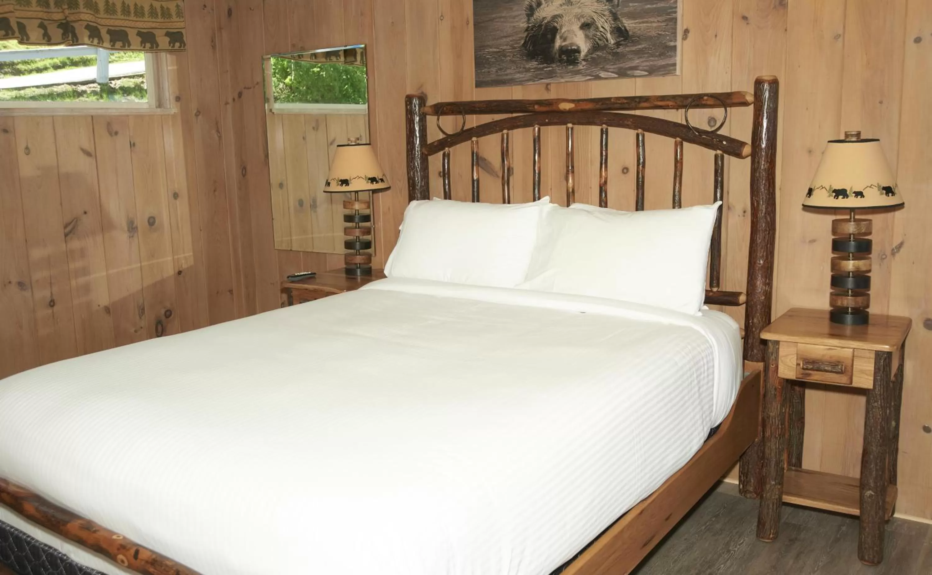 Bed in Belknap Point Inn