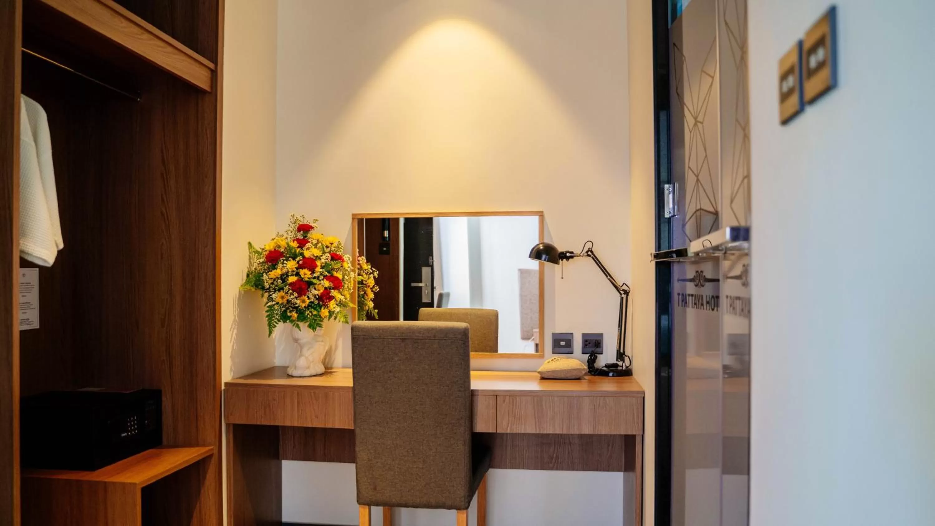 Seating area in SureStay Plus by Best Western T Pattaya