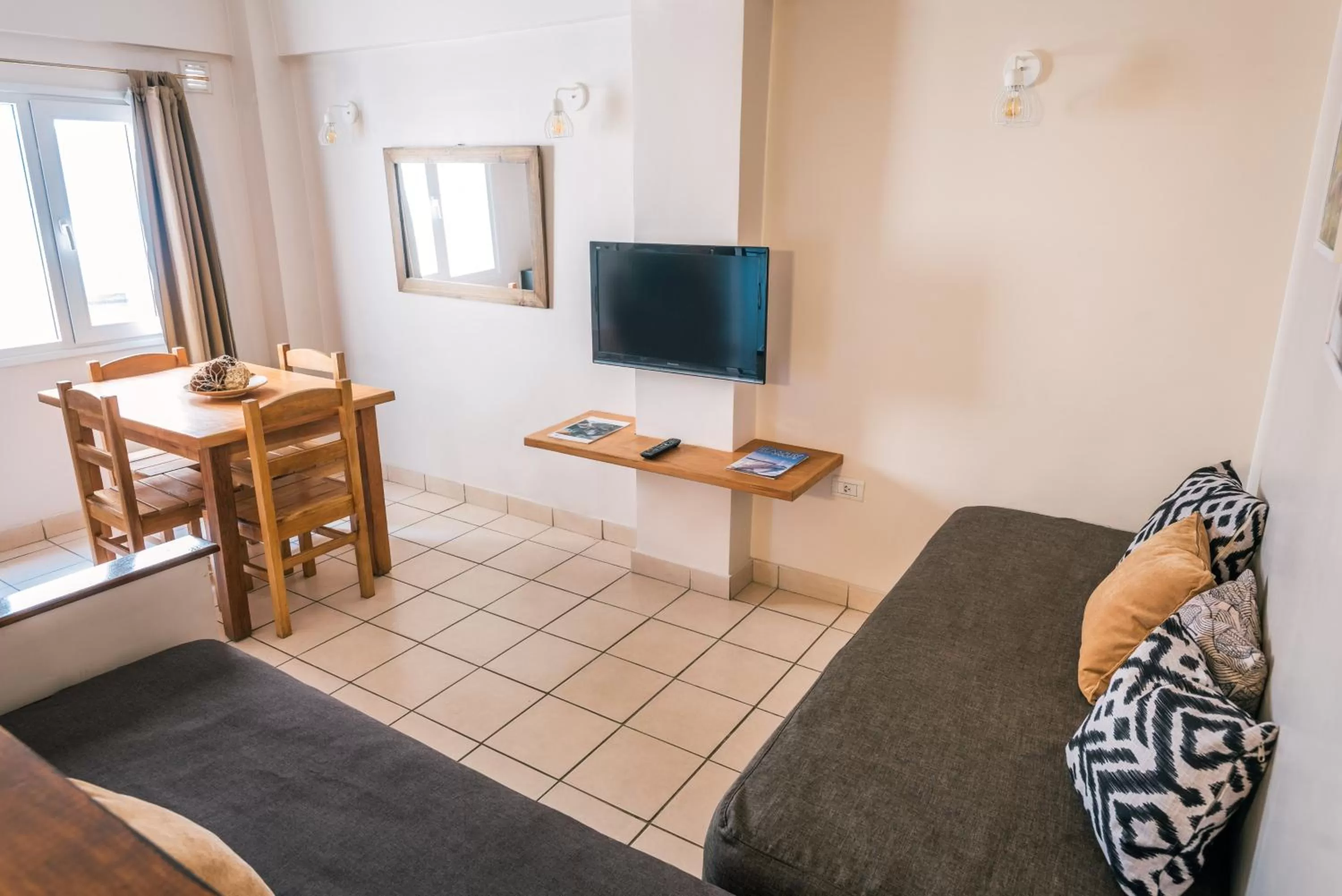 Communal lounge/ TV room, TV/Entertainment Center in Riviera Fueguina Apartments