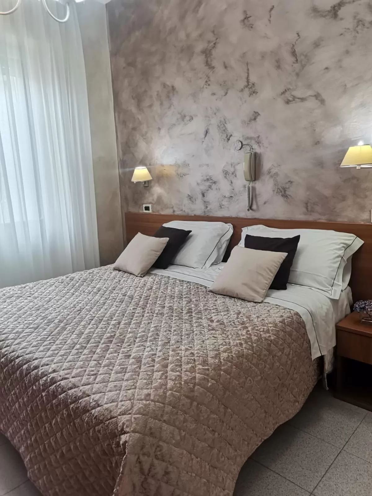 Bed in Hotel Marconi