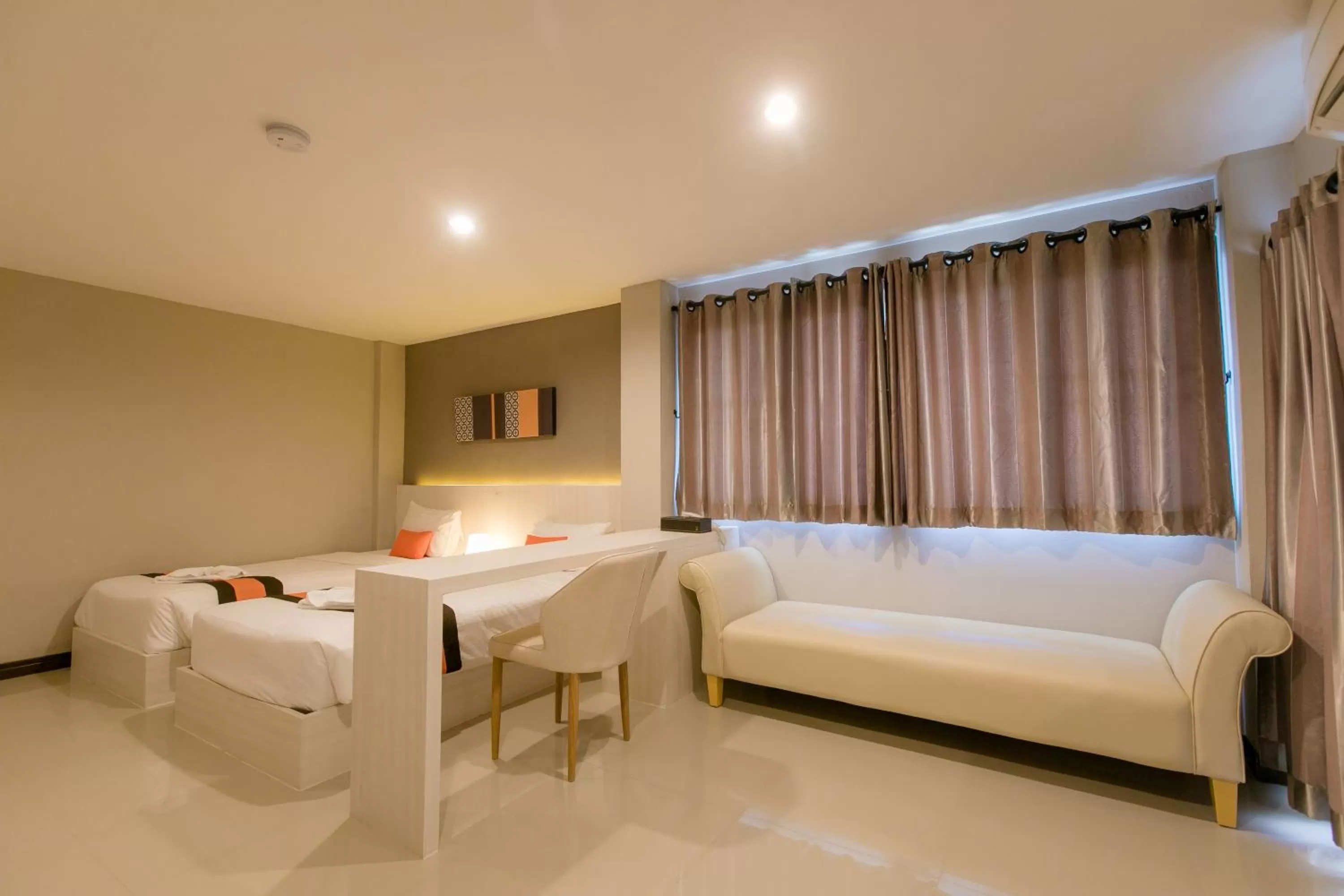 Bed in De Hug Hotel & Residence