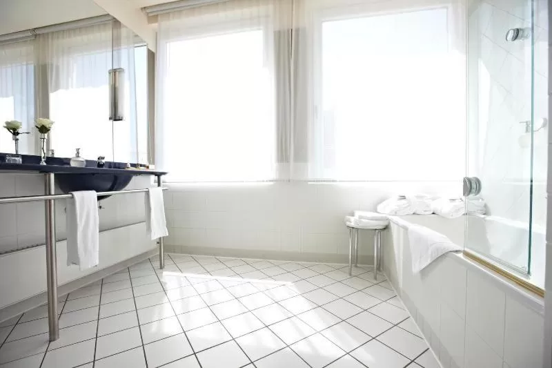 Bathroom in Vienna House by Wyndham Sonne Rostock