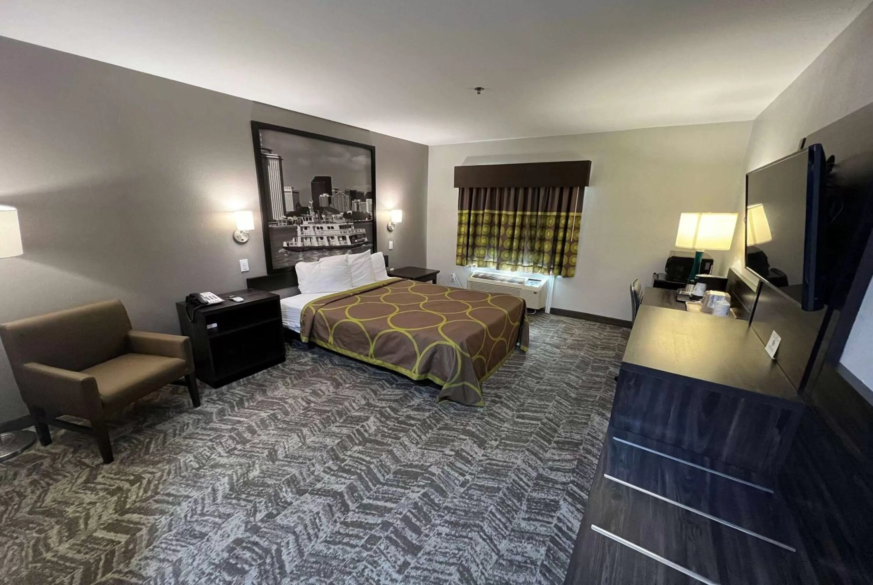 Photo of the whole room, Bed in Super 8 by Wyndham Lake Charles/Sulphur