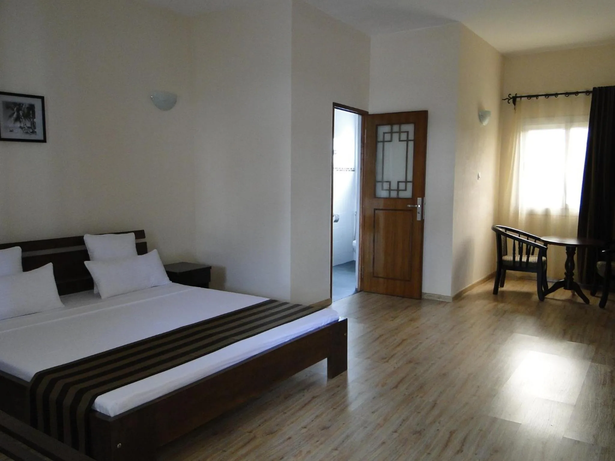 Photo of the whole room, Bed in Hotel H1 Antsirabe