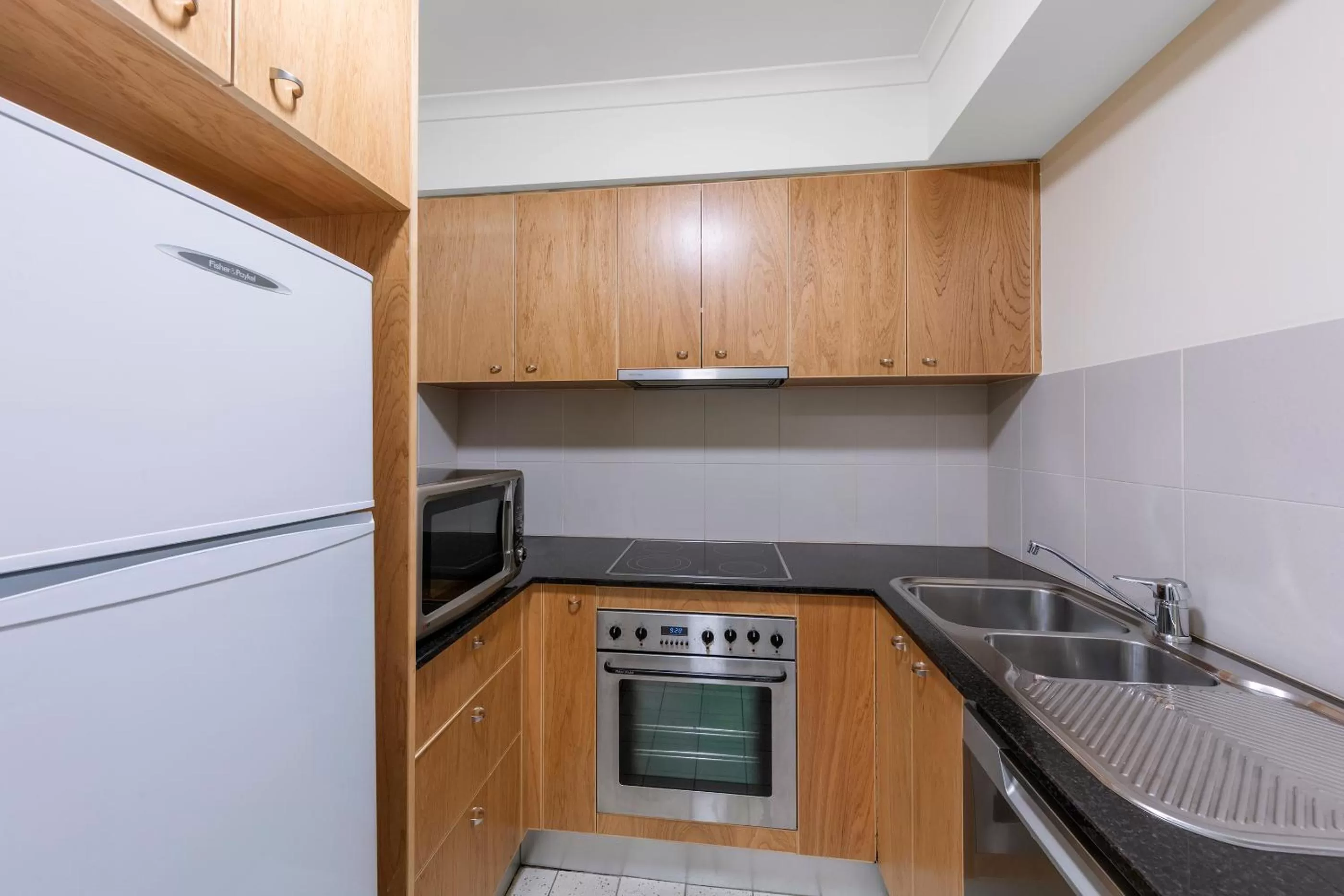 Kitchen or kitchenette in Nesuto Canberra