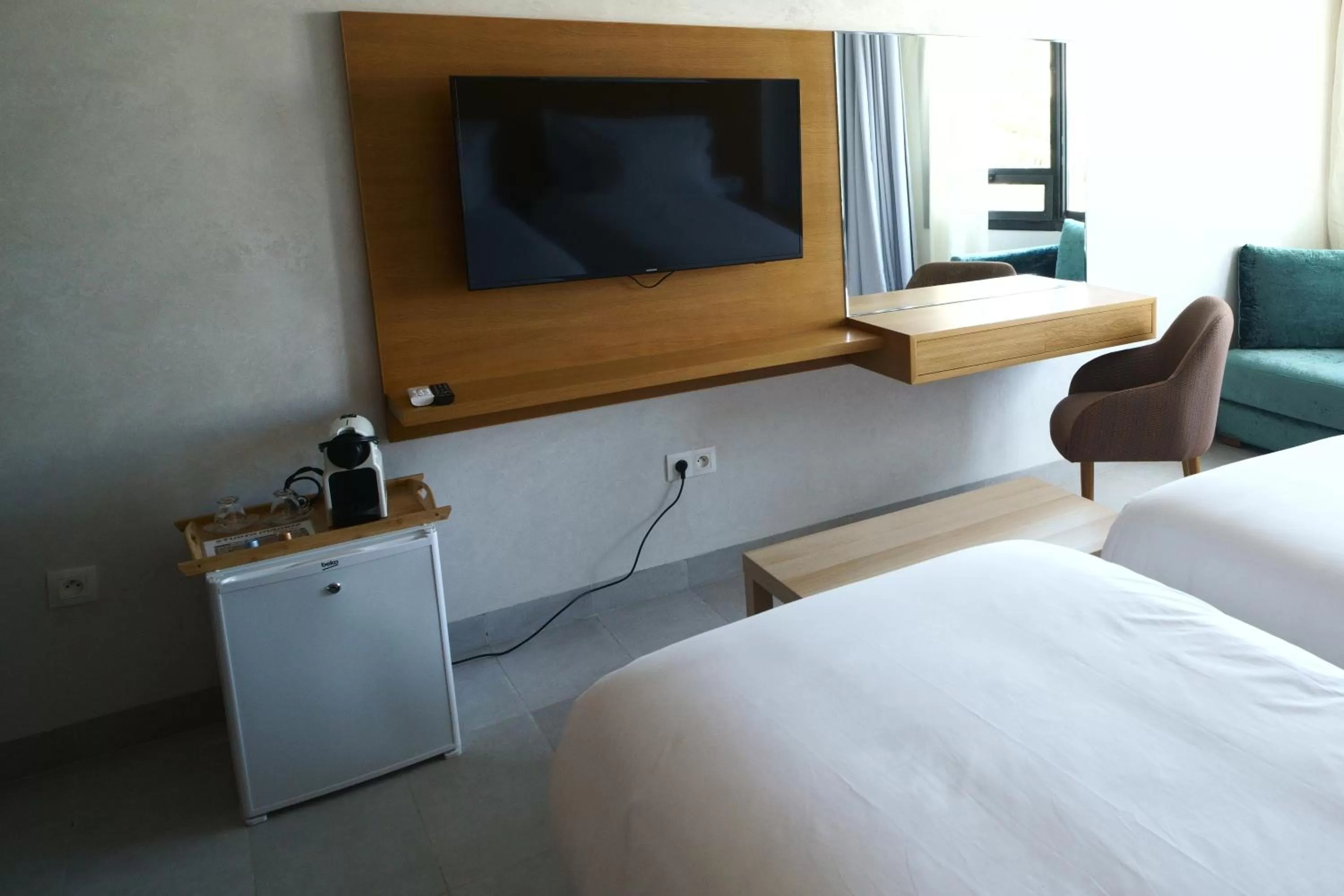 Communal lounge/ TV room, Bed in Maarif Home Casablanca