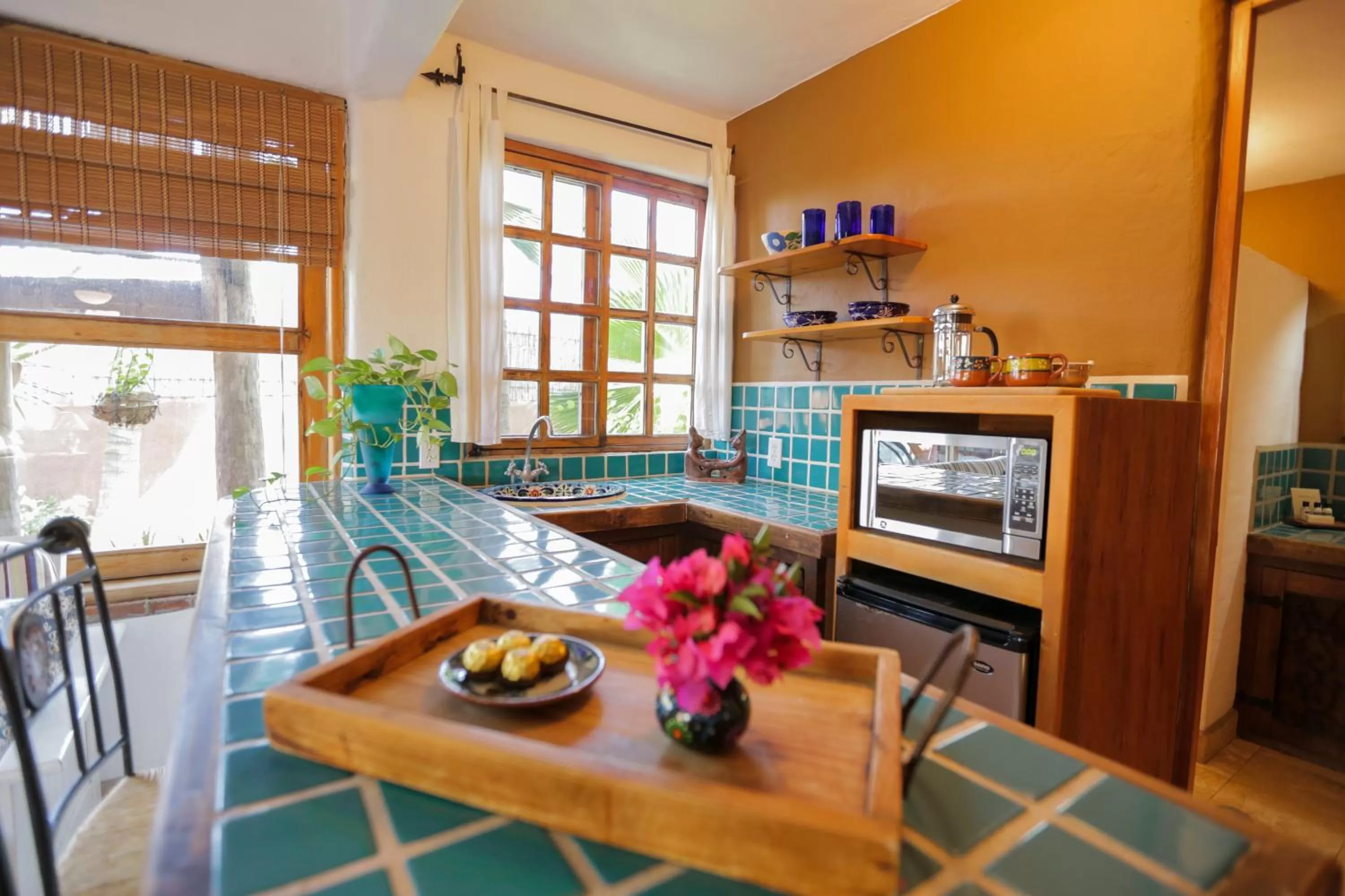 Kitchen or kitchenette in The Bungalows Hotel