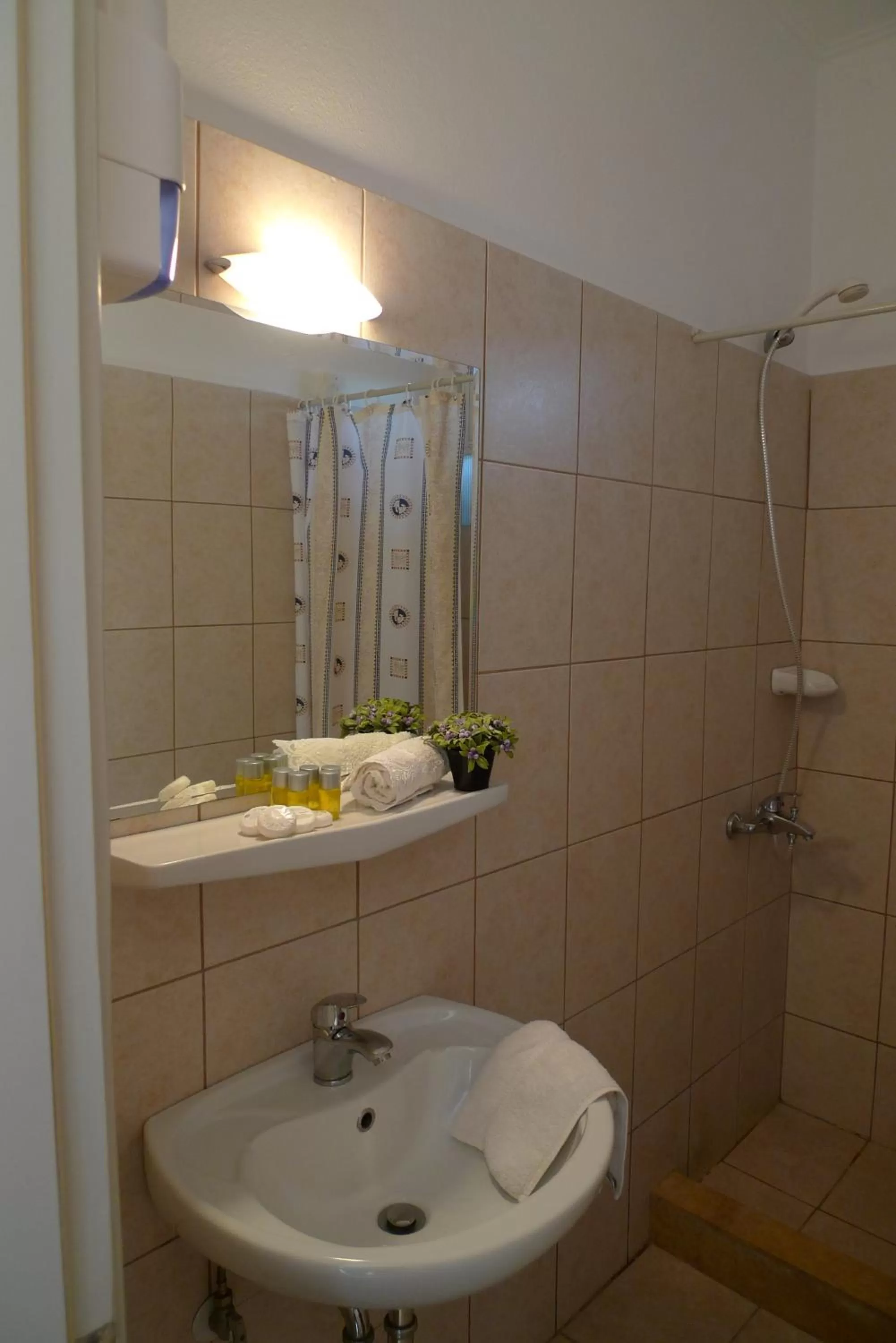 Bathroom in IKAROS Hotel ELLINIKO