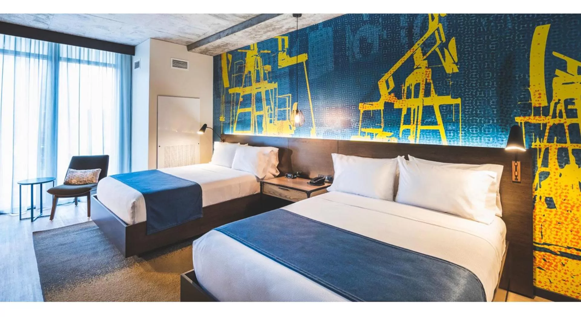 Bed in Hotel Indigo Tulsa DWTN/Entertainment Area