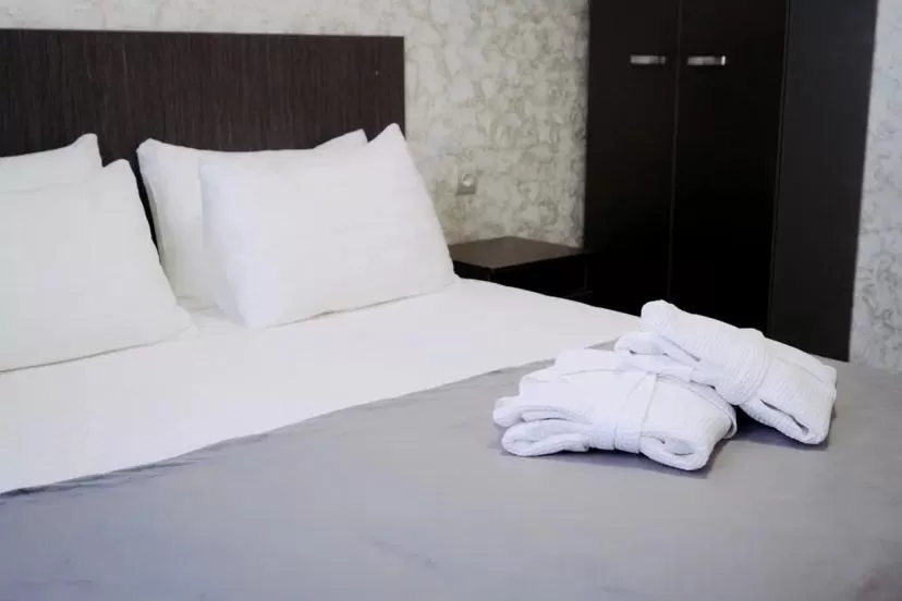 Bed in Rush Hotel