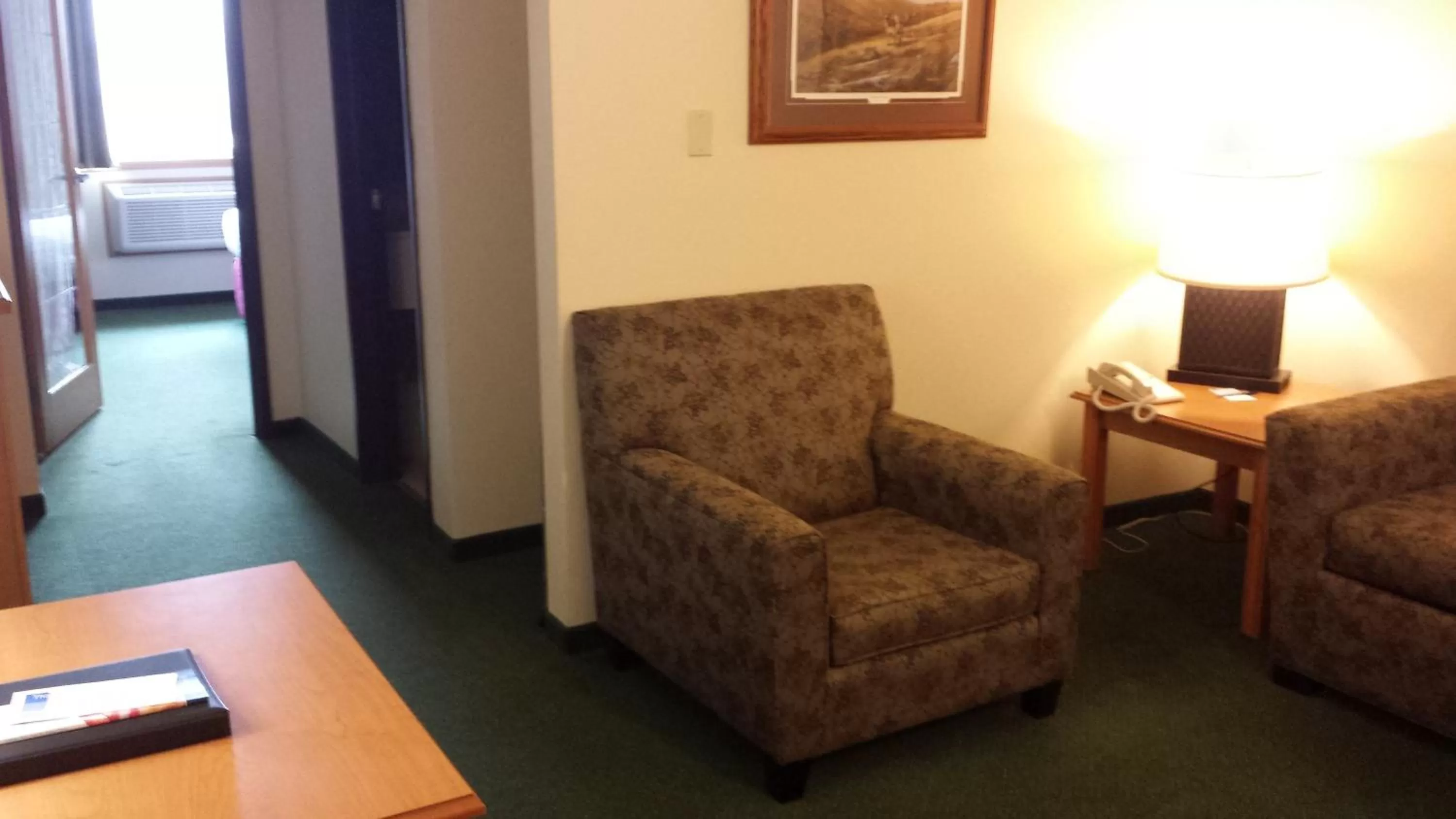 Living room in AmericInn by Wyndham Madison SD