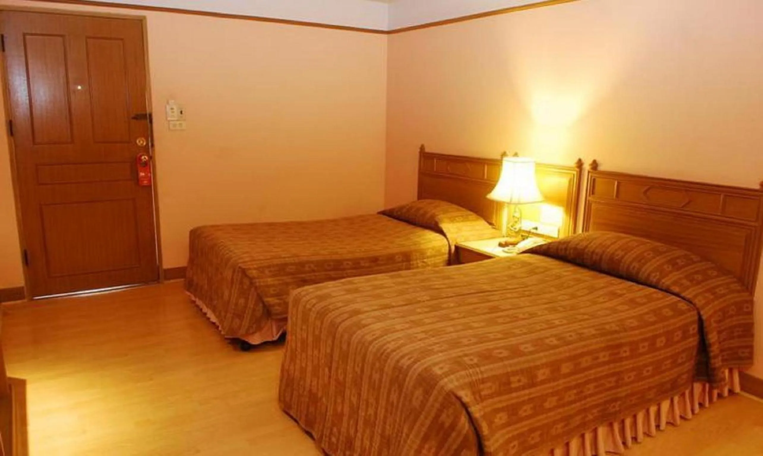 Bed in Silom Village Inn