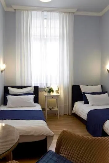 Bed in Buchholz Downtown Hotel