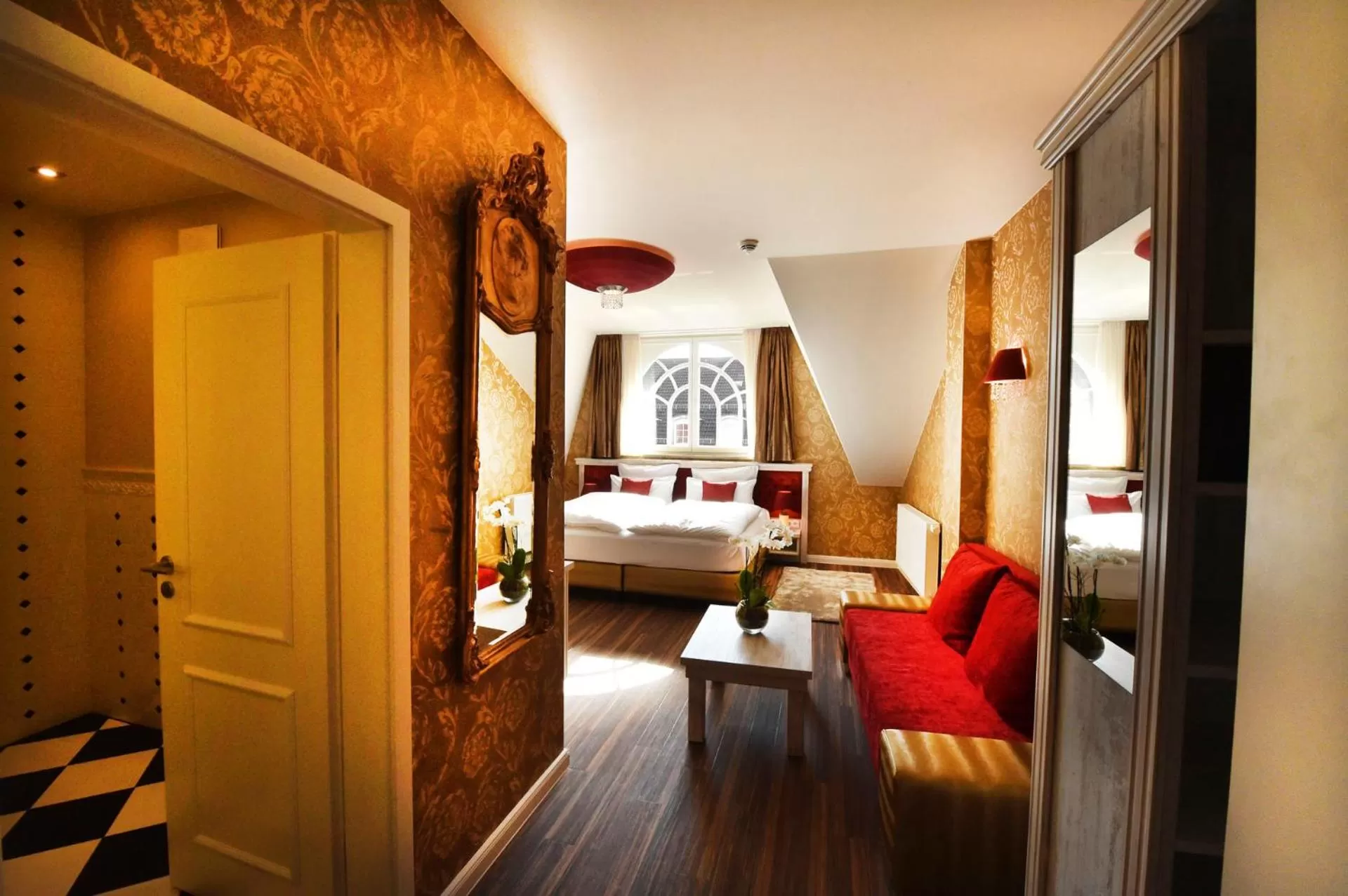 Photo of the whole room, Bed in MOMENTS Boutique Hotel