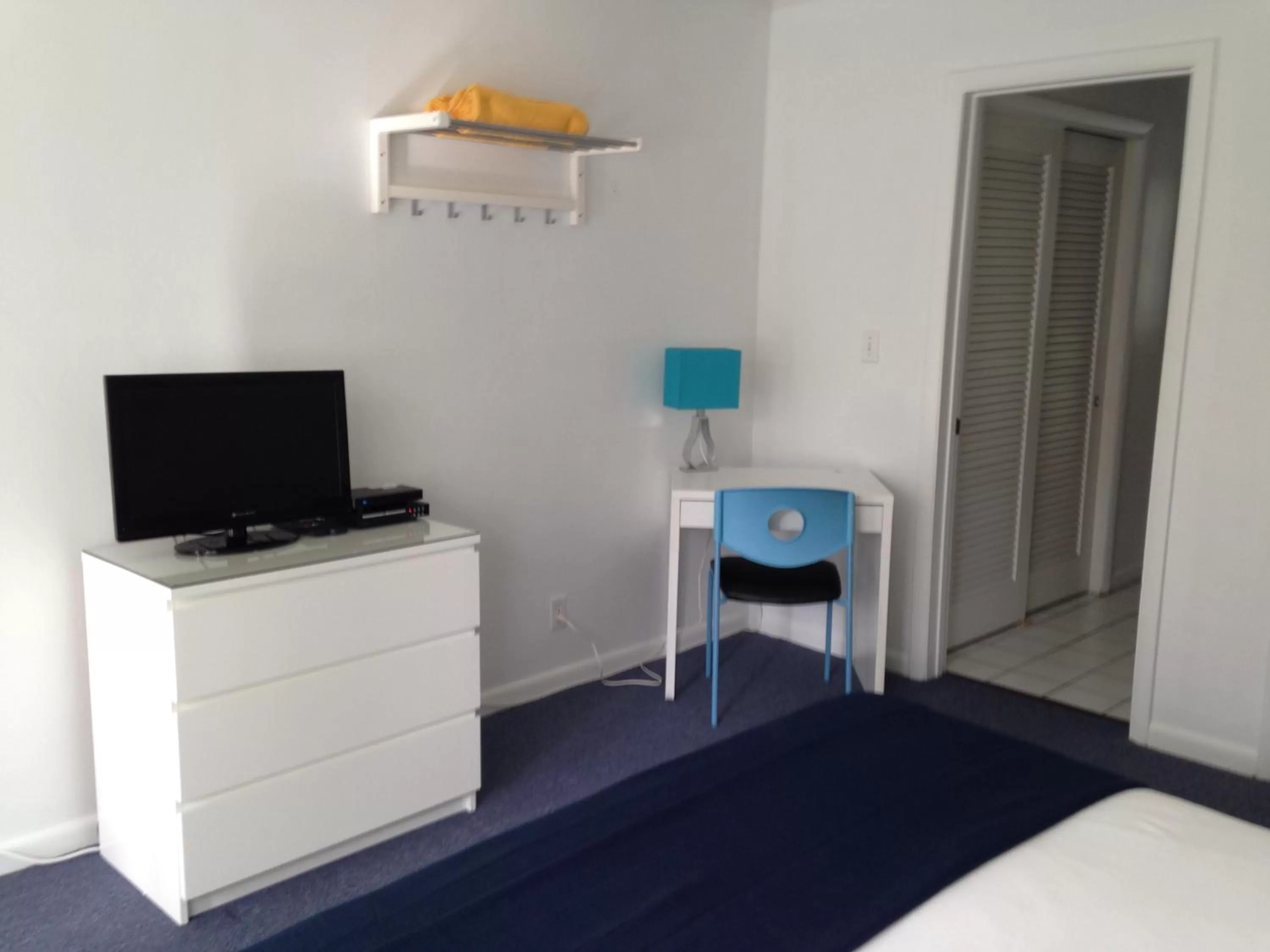 Photo of the whole room, TV/Entertainment Center in Cheston House - Clothing Optional All Male Guesthouse