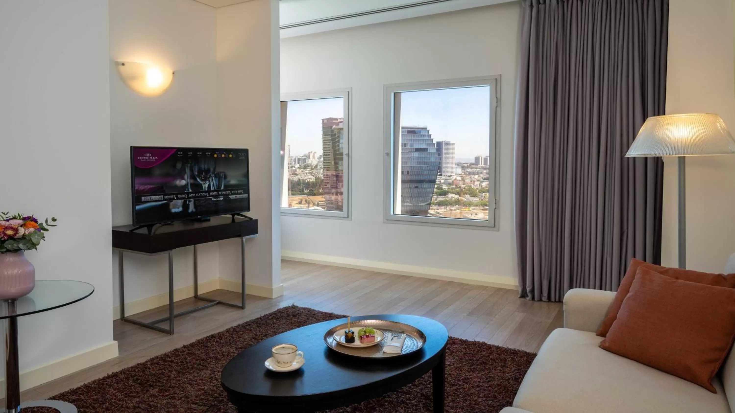 Living room in Crowne Plaza Tel Aviv City Center by IHG