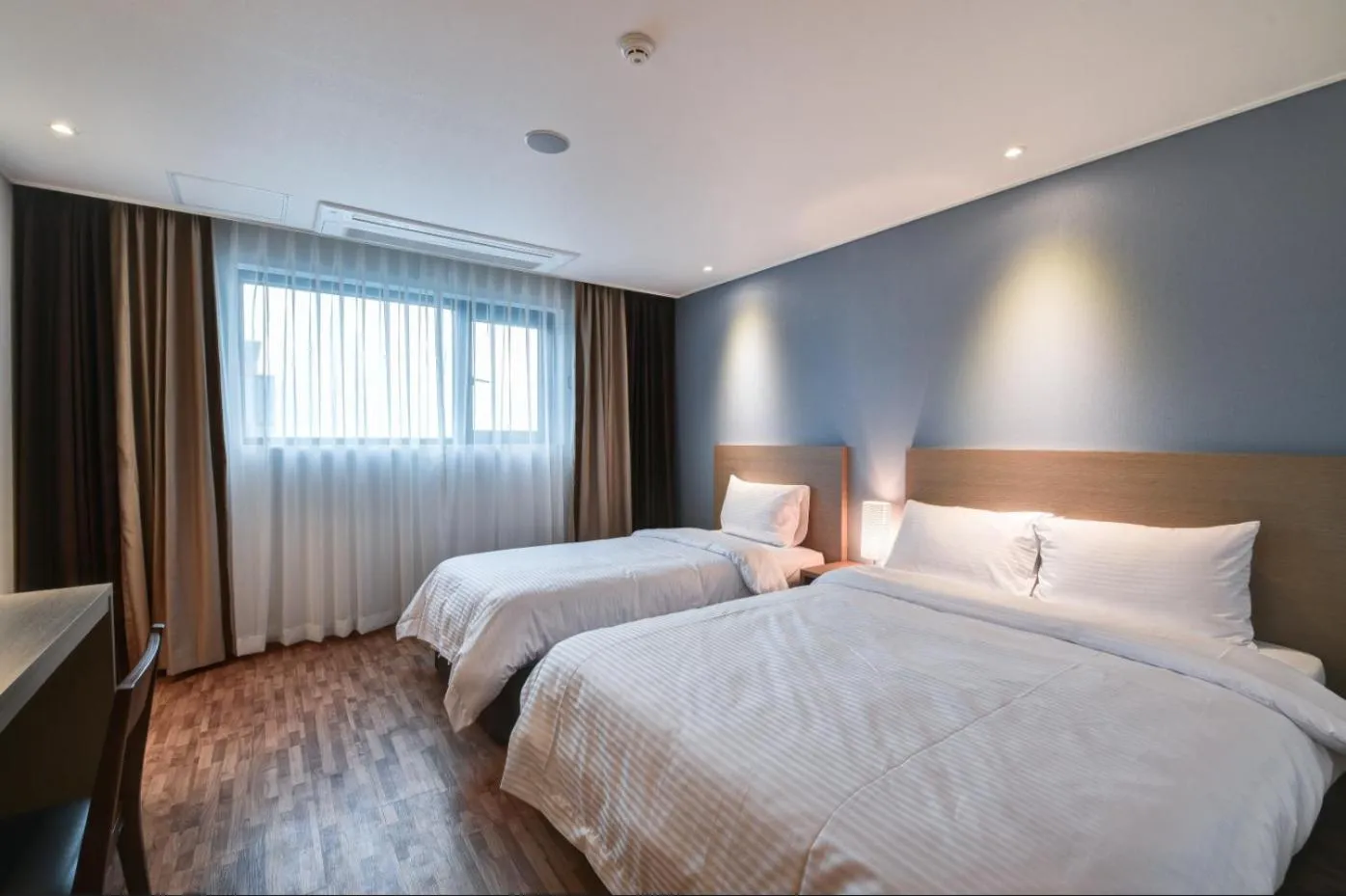 Photo of the whole room, Bed in Sea Moon Tourist Hotel