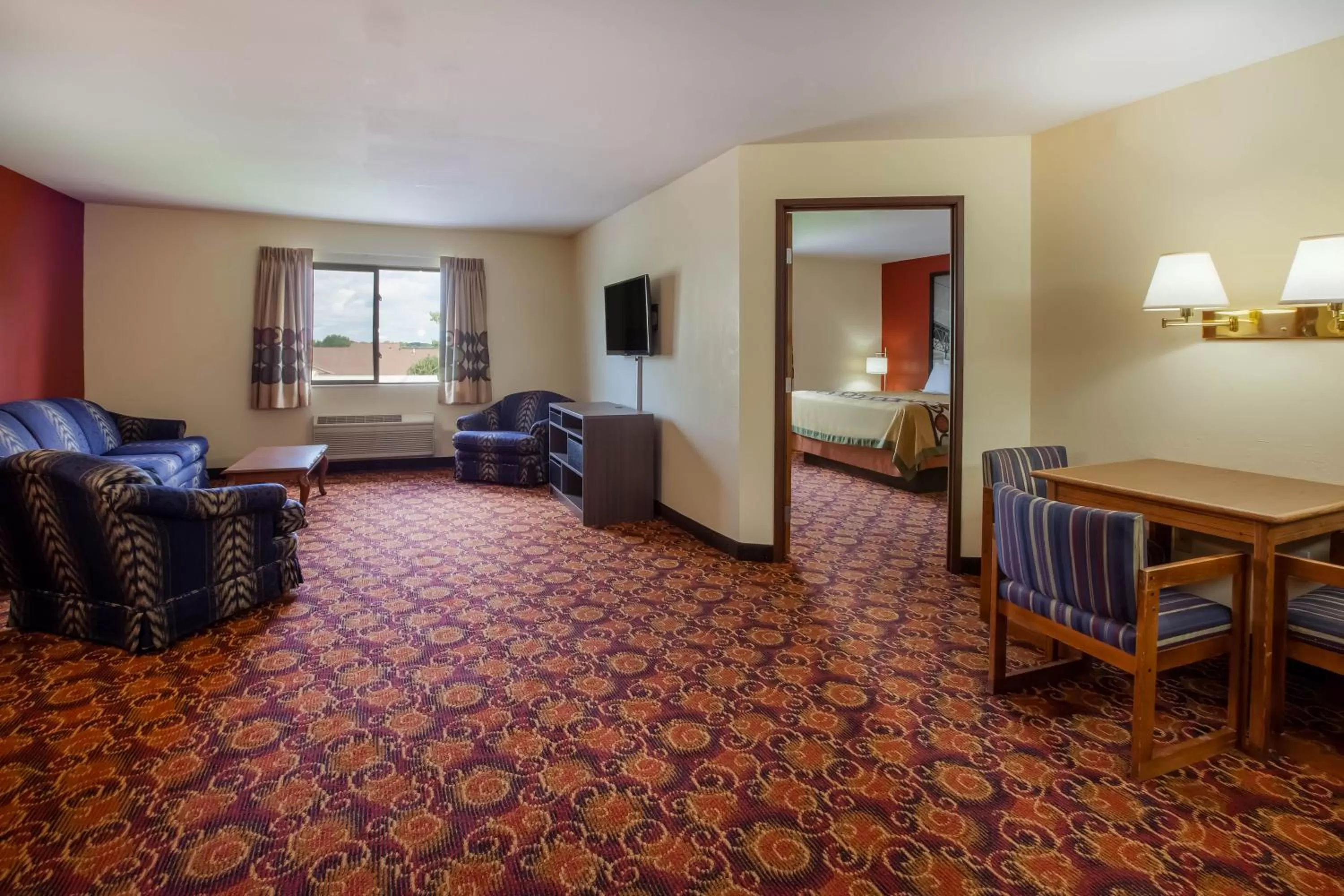 Deluxe King Suite with Spa Bath - Non-Smoking in Super 8 by Wyndham Big Rapids