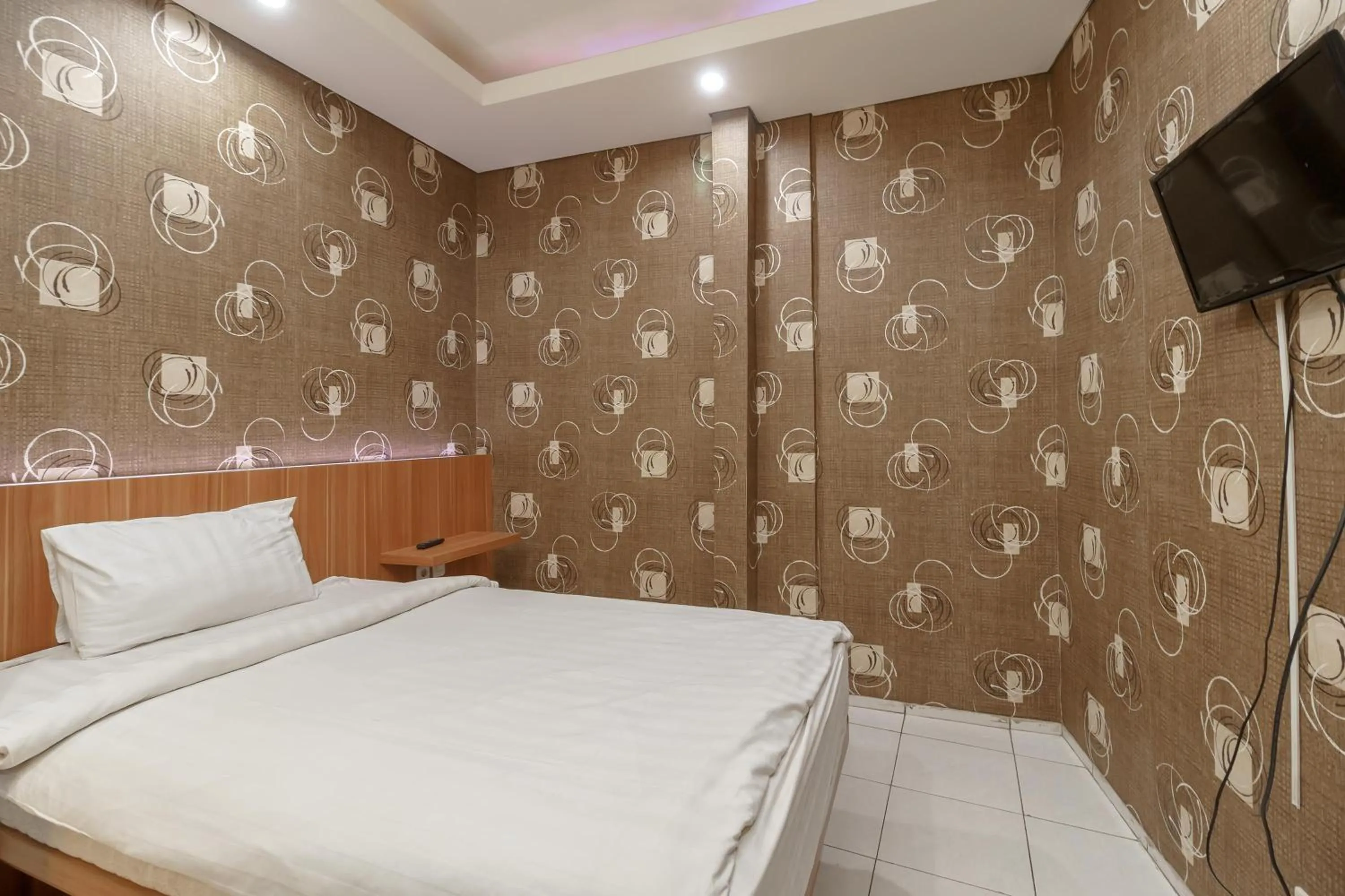 Bed in Green Apple Residence near Sarinah Mitra RedDoorz