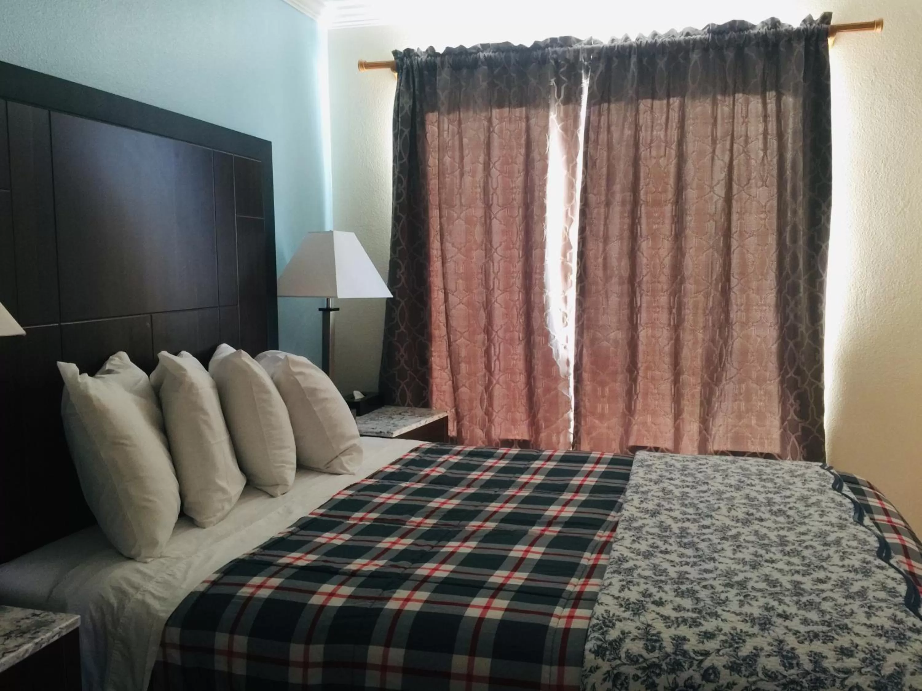 Bed in Dolphin Cove Motel