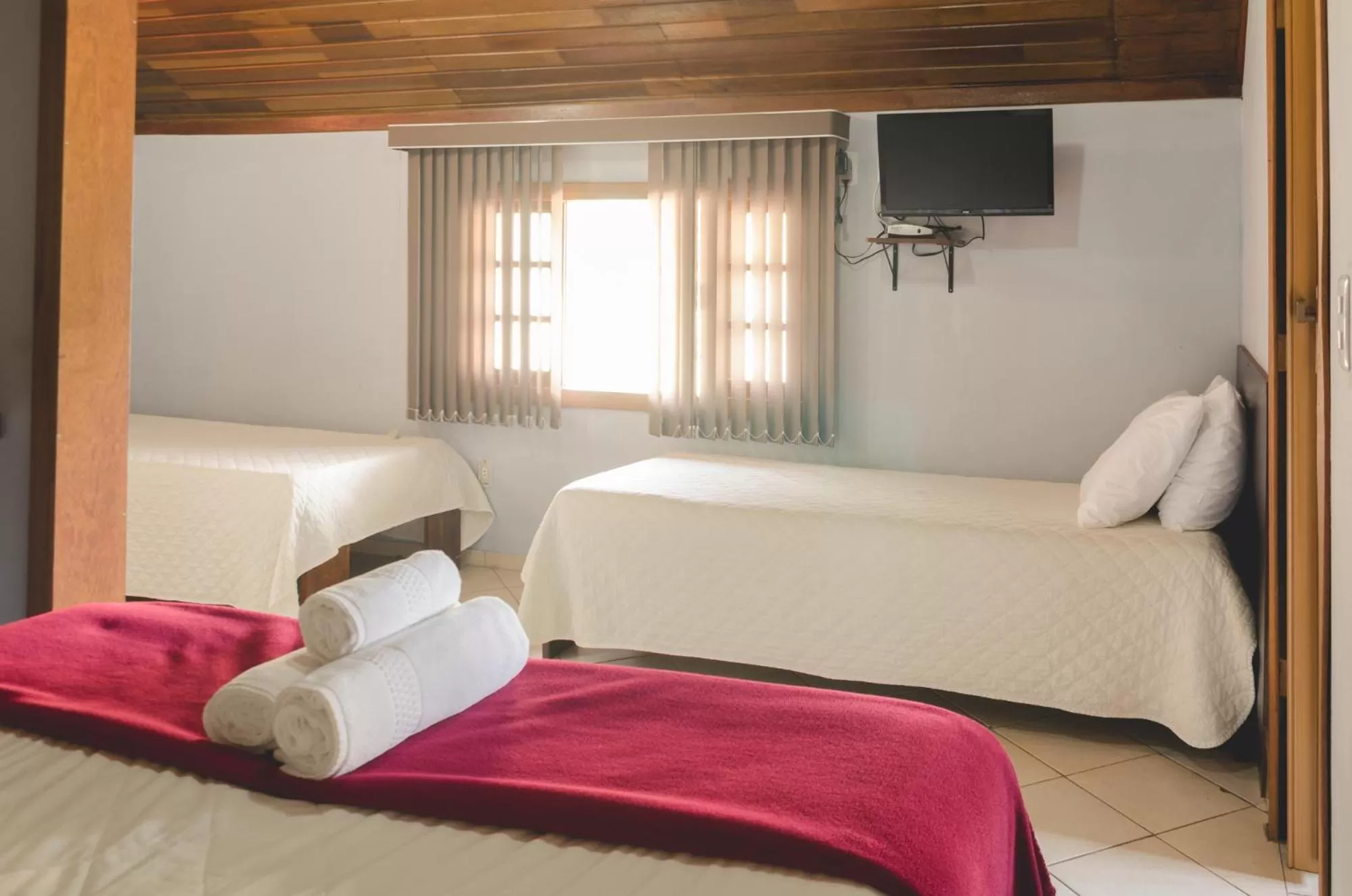 Bed in Pousada Ilha da Magia