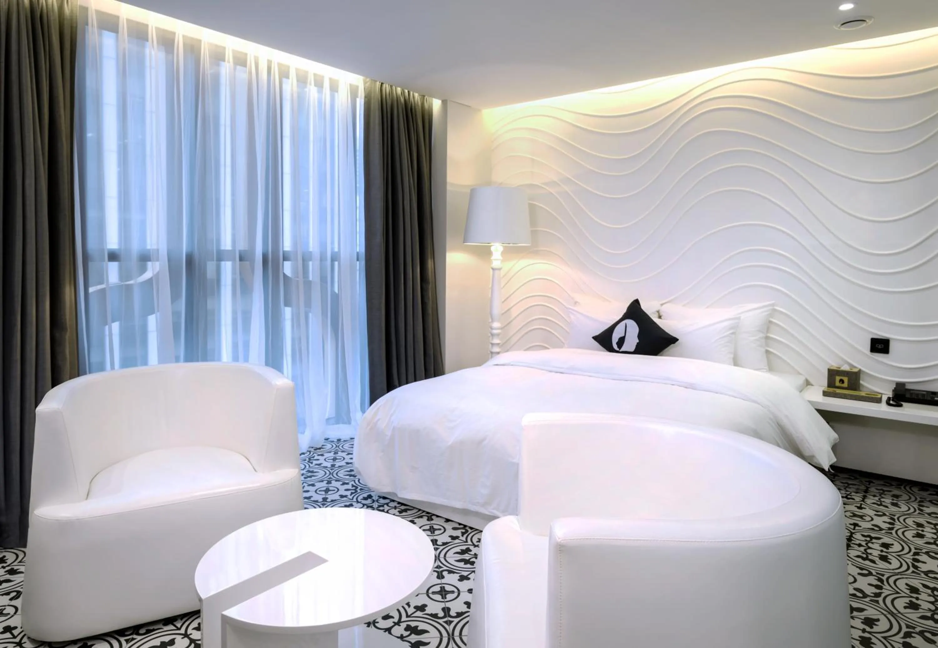 Seating area, Bed in Hotel The Designers Dongdaemun