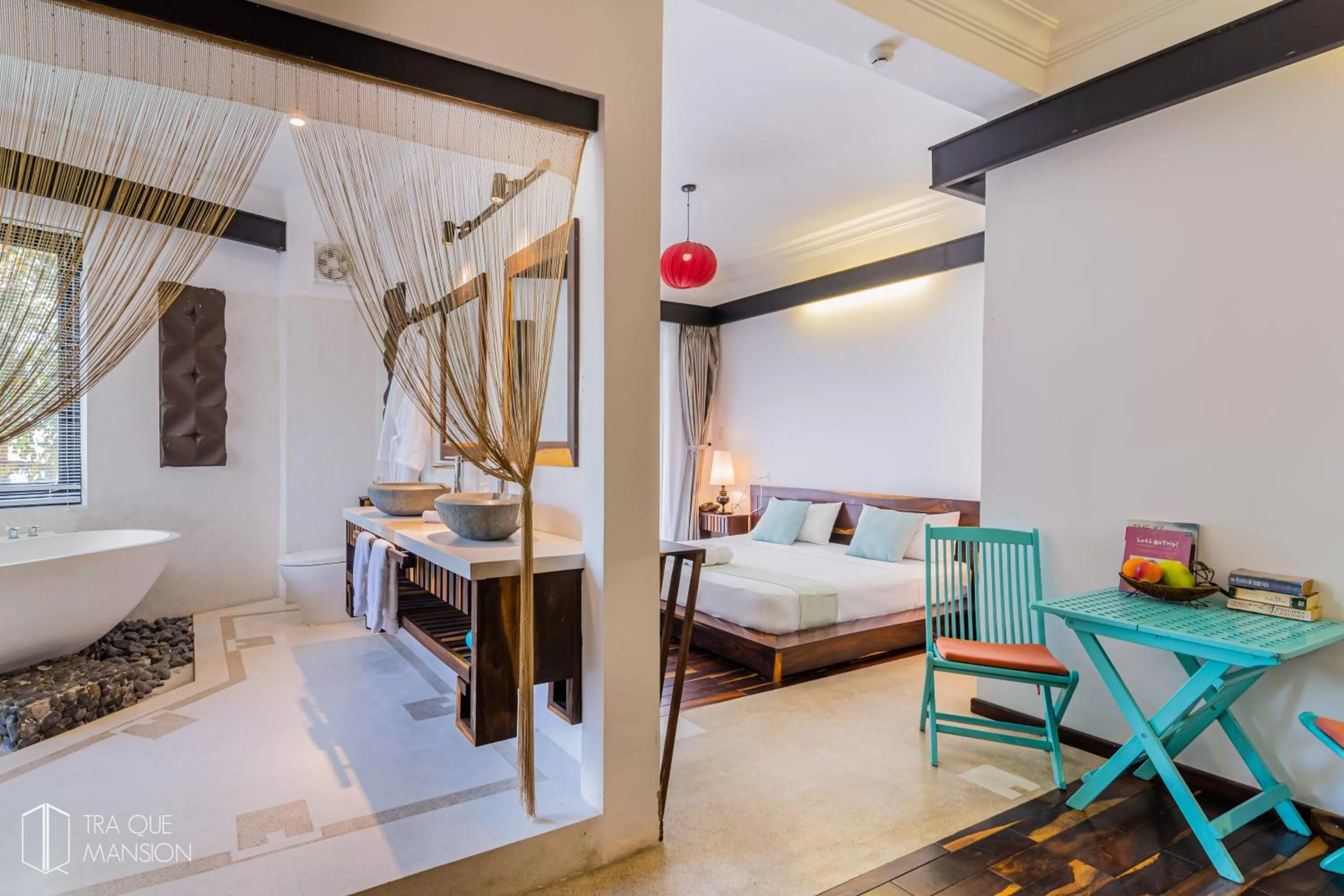 Photo of the whole room, Bed in Tra Que Mansion