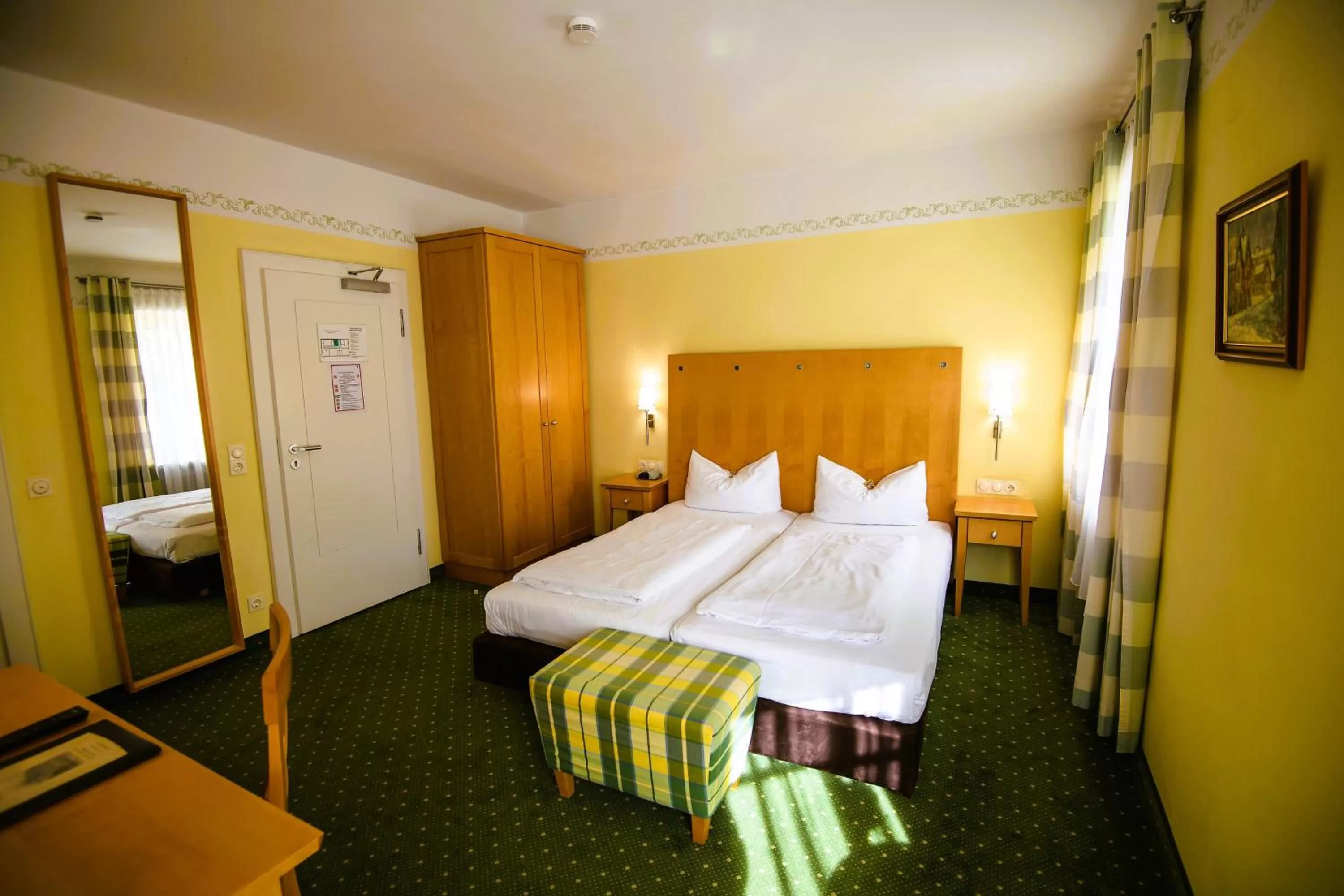 Bed in Hotel Rosenheimer Hof