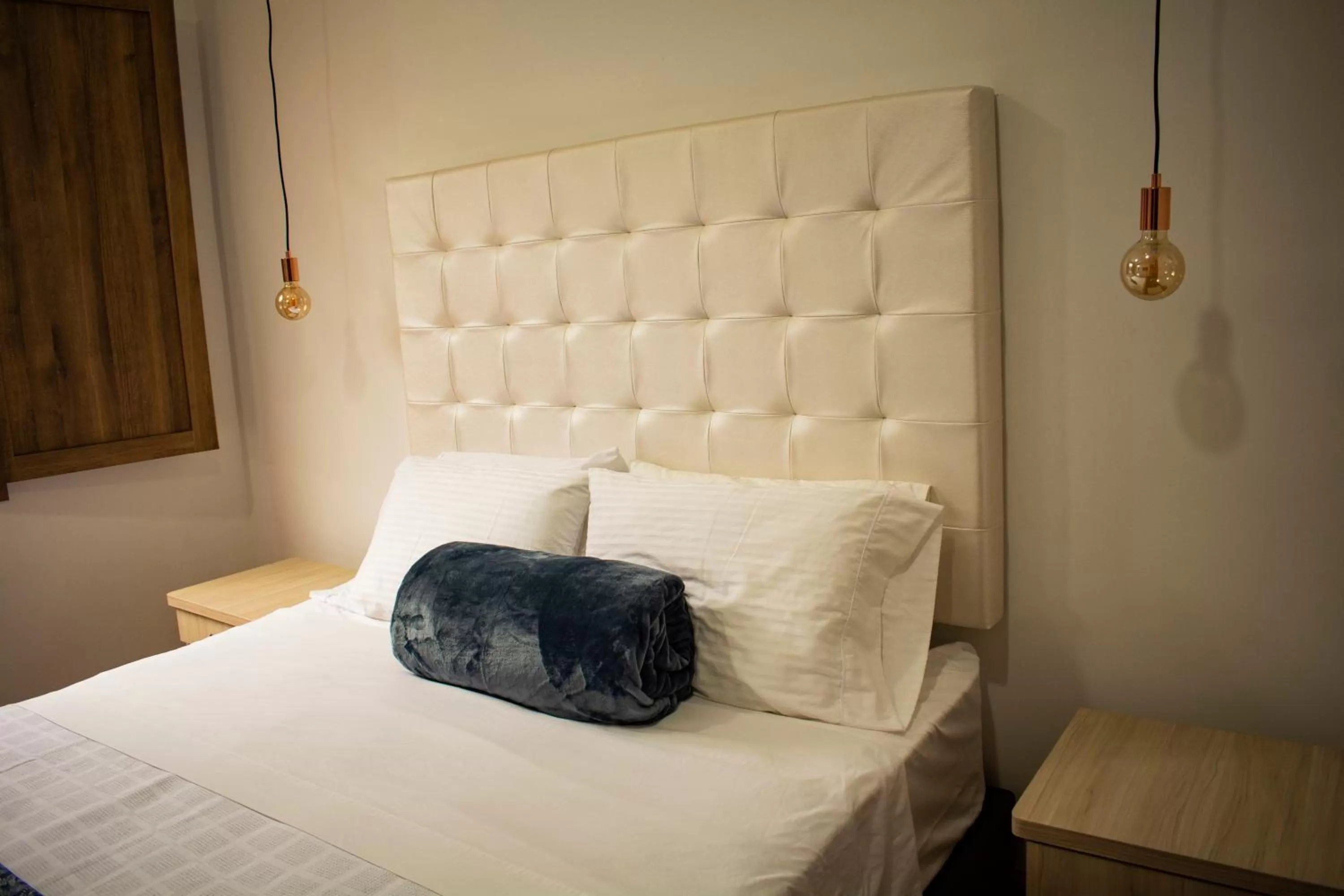 Bed in El Reloj Casa Hotel