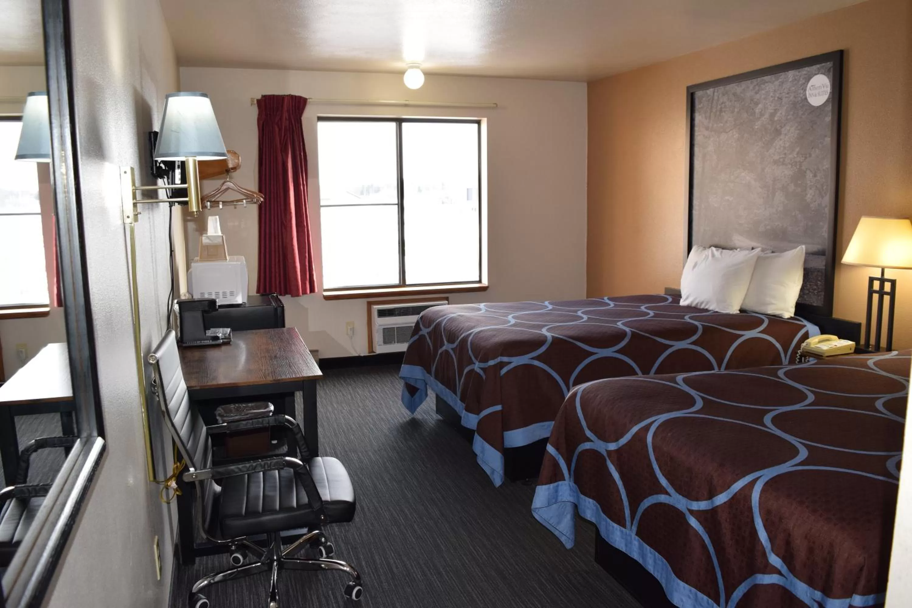 Photo of the whole room, Bed in AmeriVu Inn and Suites Shawano WI