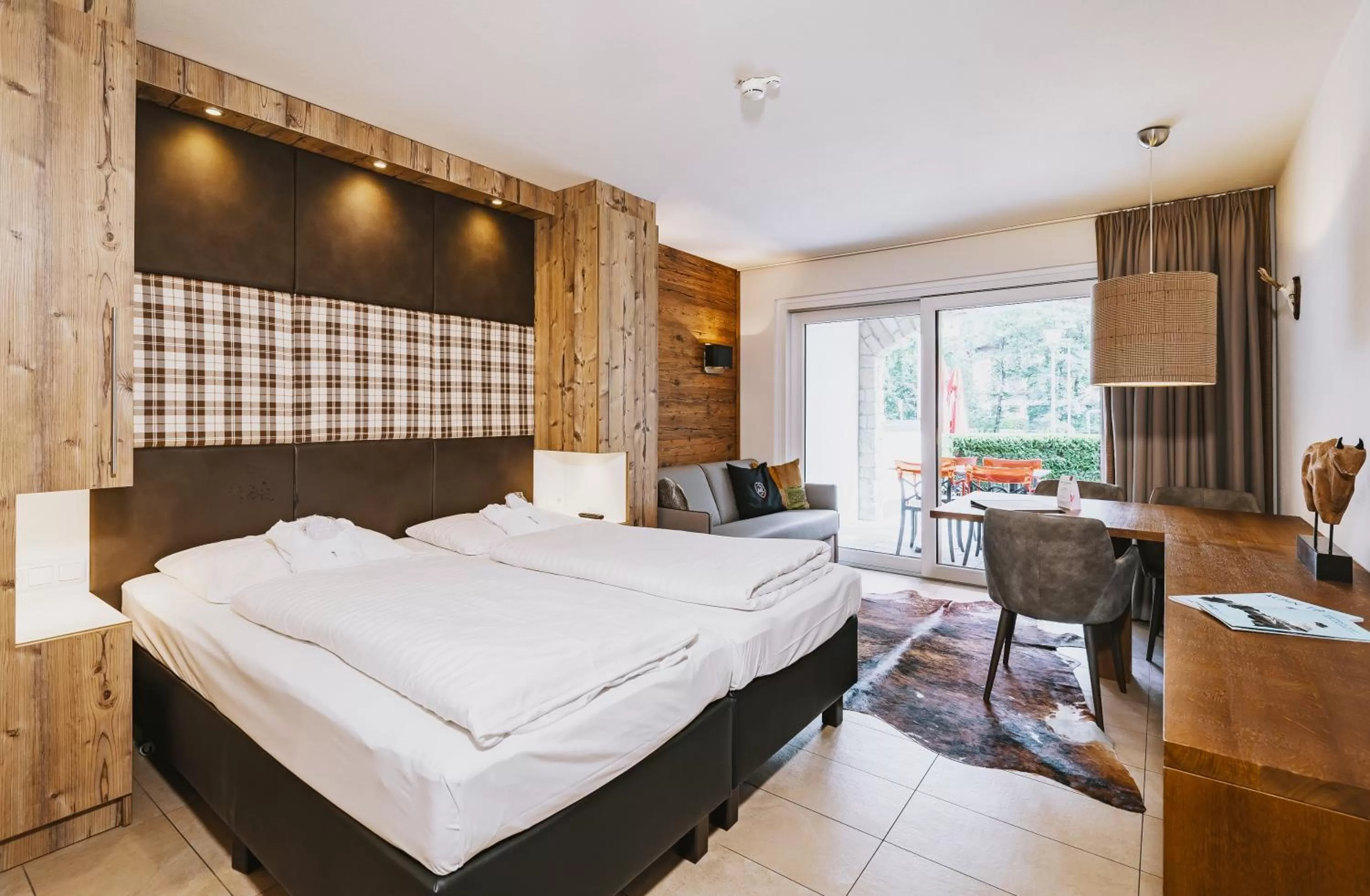 Photo of the whole room, Bed in AvenidA Mountain Lodges Kaprun