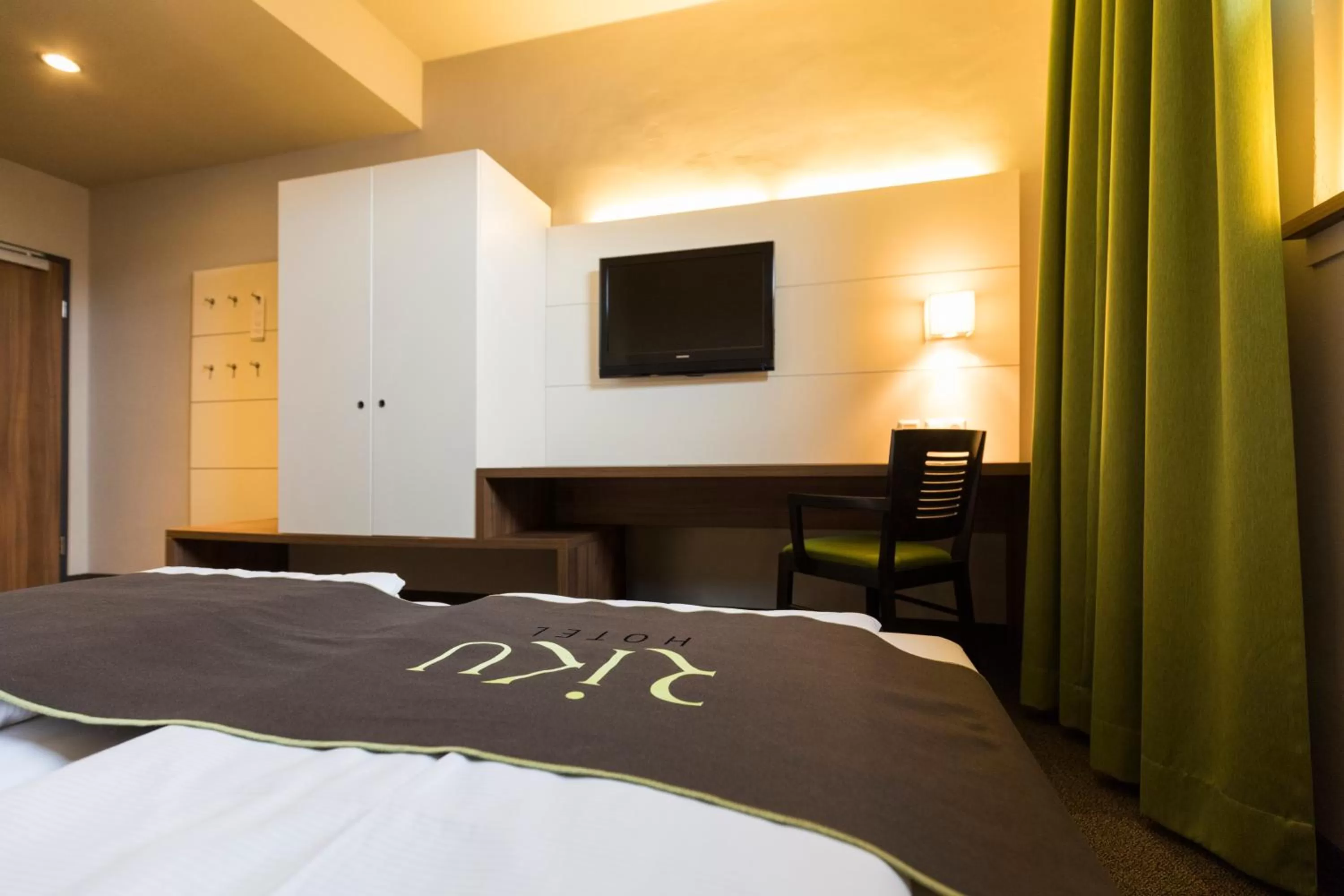 Photo of the whole room, Bed in RiKu HOTEL Neu-Ulm