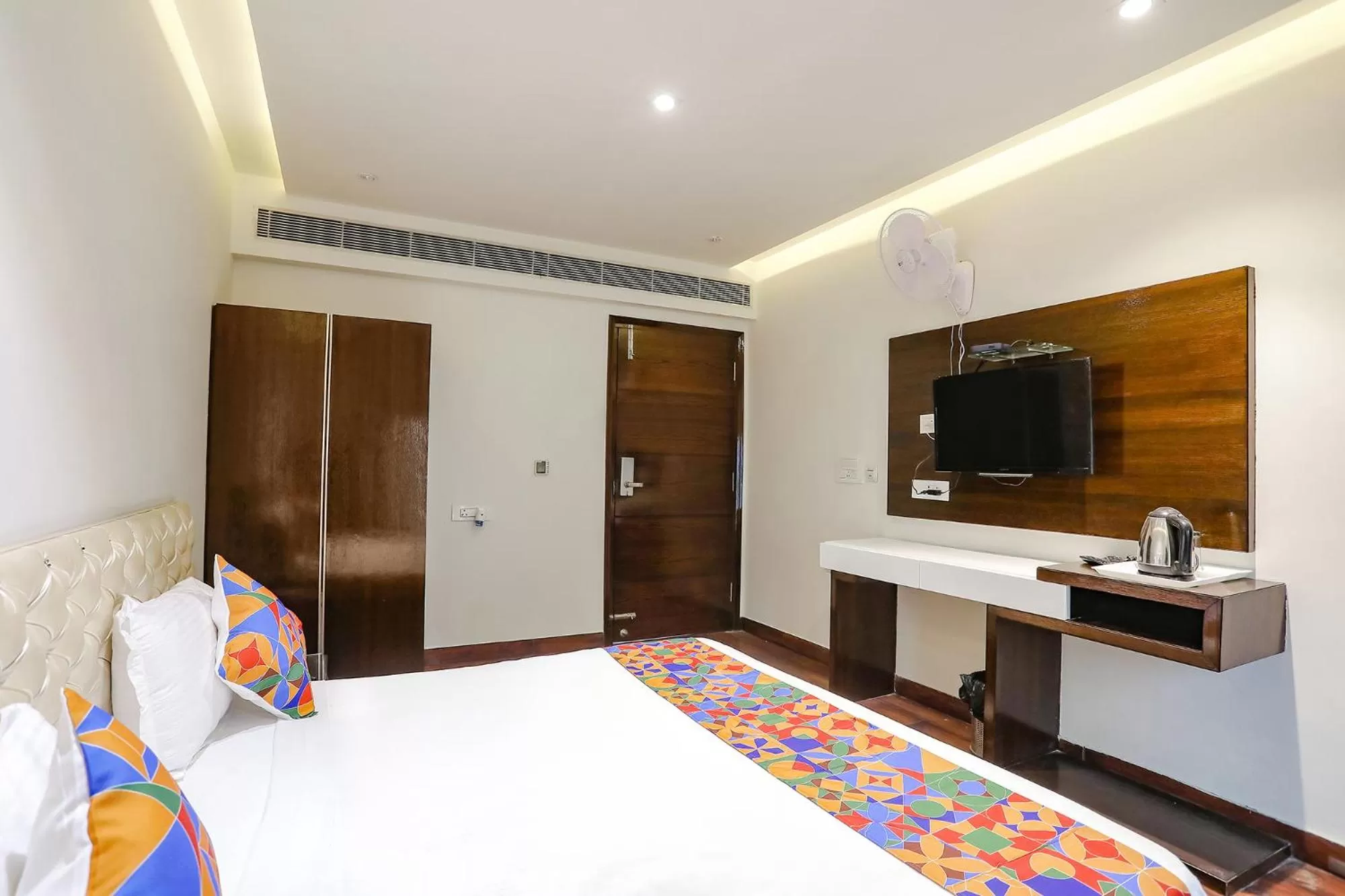 Communal lounge/ TV room, Bed in FabHotel Grand Stay