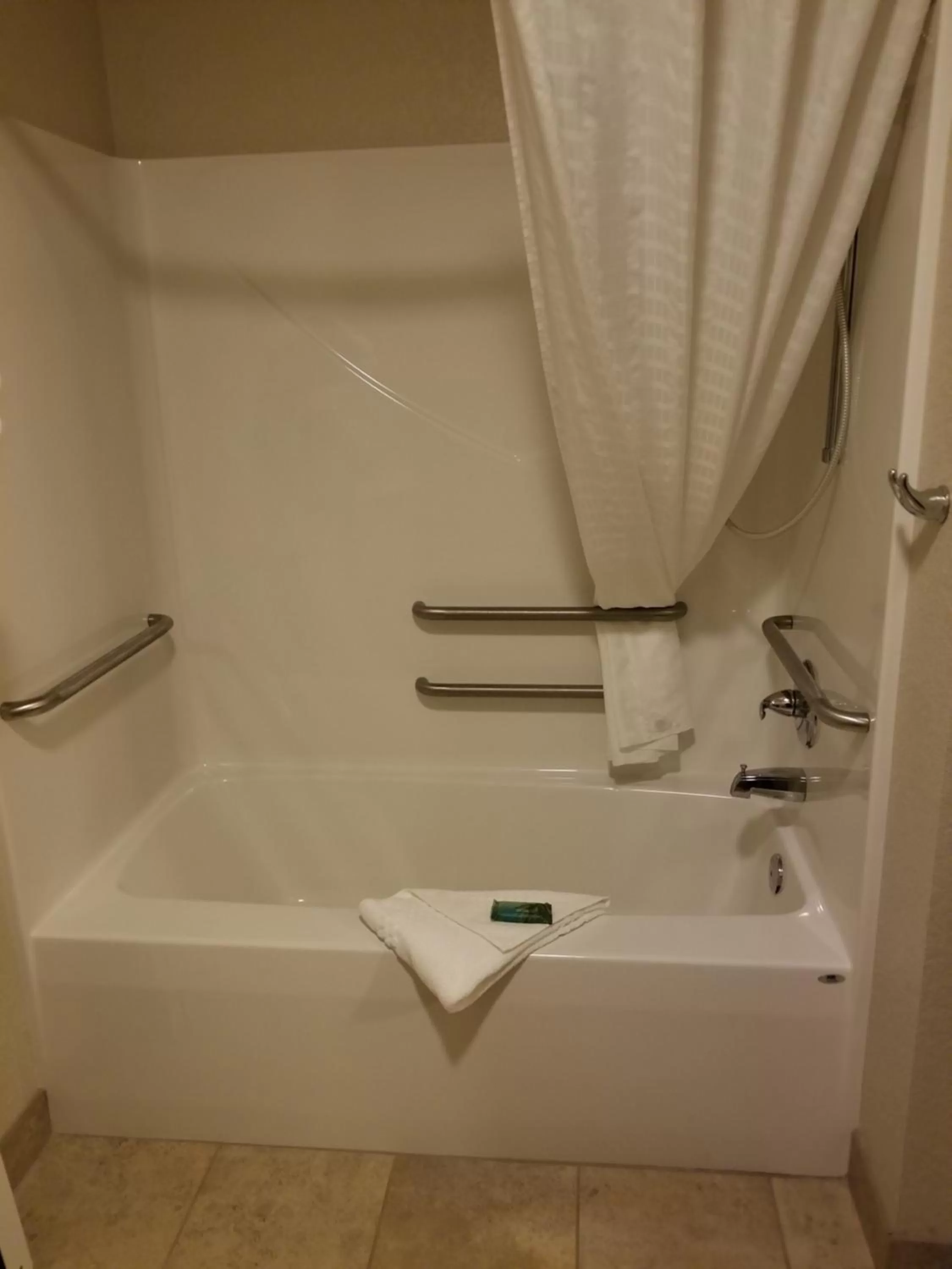 Shower in Cobblestone Inn & Suites - Clarion