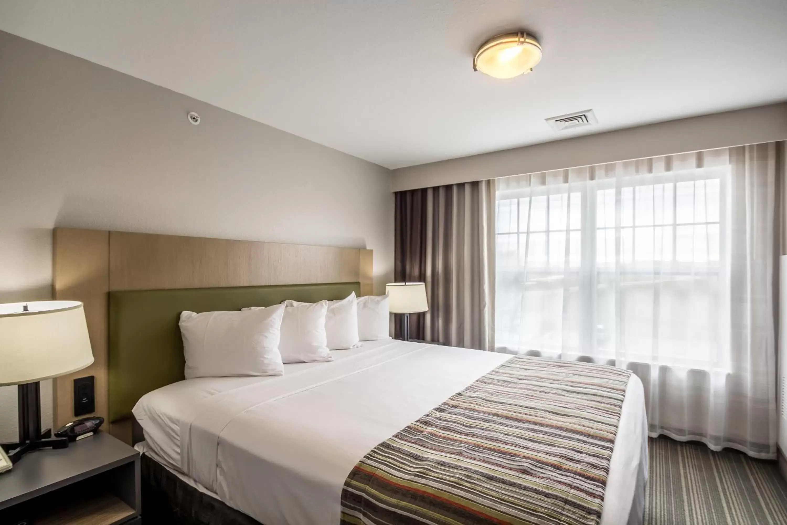 One-Bedroom King Suite with Sofa Bed - Non-Smoking in Country Inn & Suites by Radisson, Fond du Lac, WI One-Bedroom King Suite with Sofa Bed - Non-Smoking in Country Inn & Suites by Radisson, Fond du Lac, WI