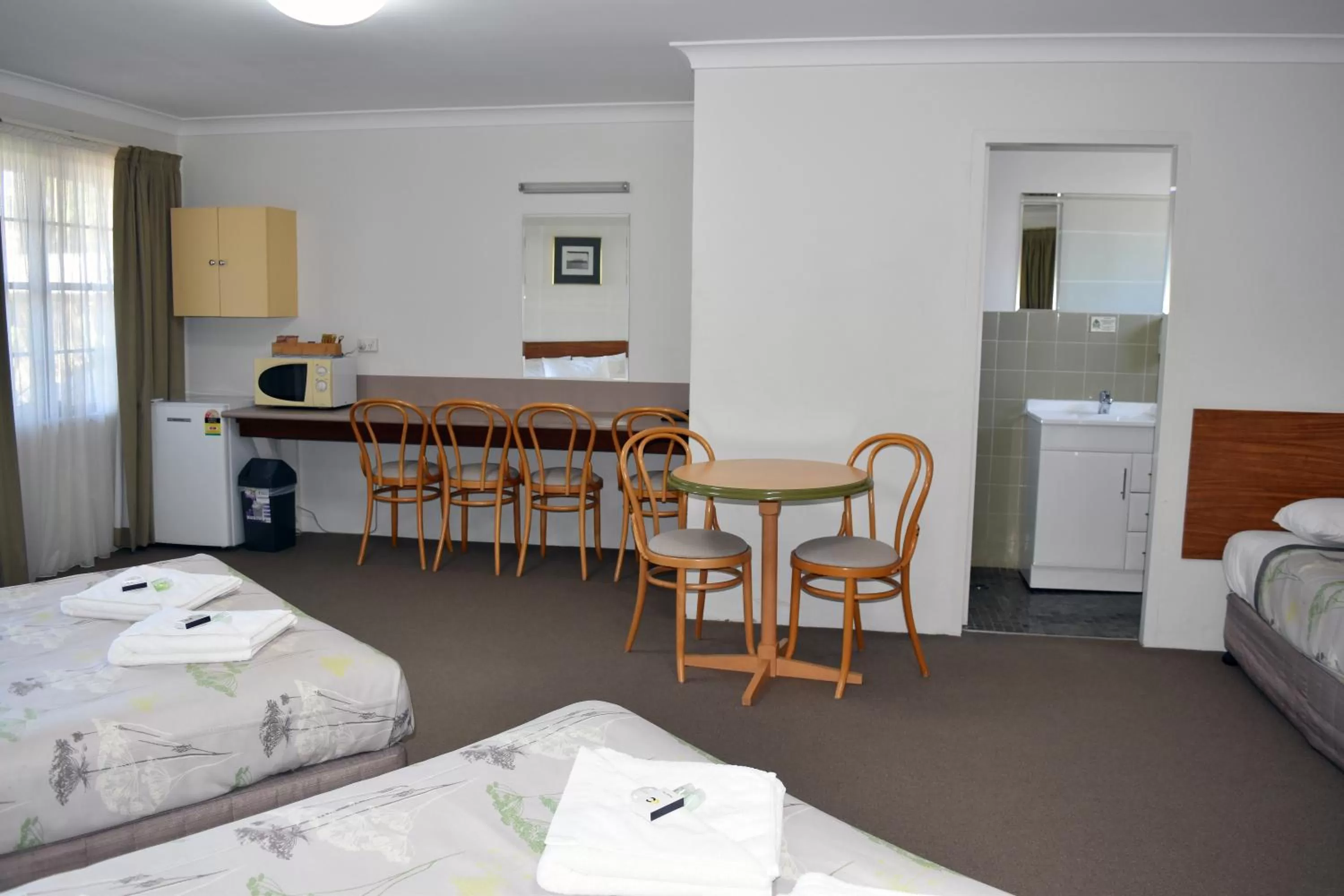 Bed in Ten Dollar Town Motel