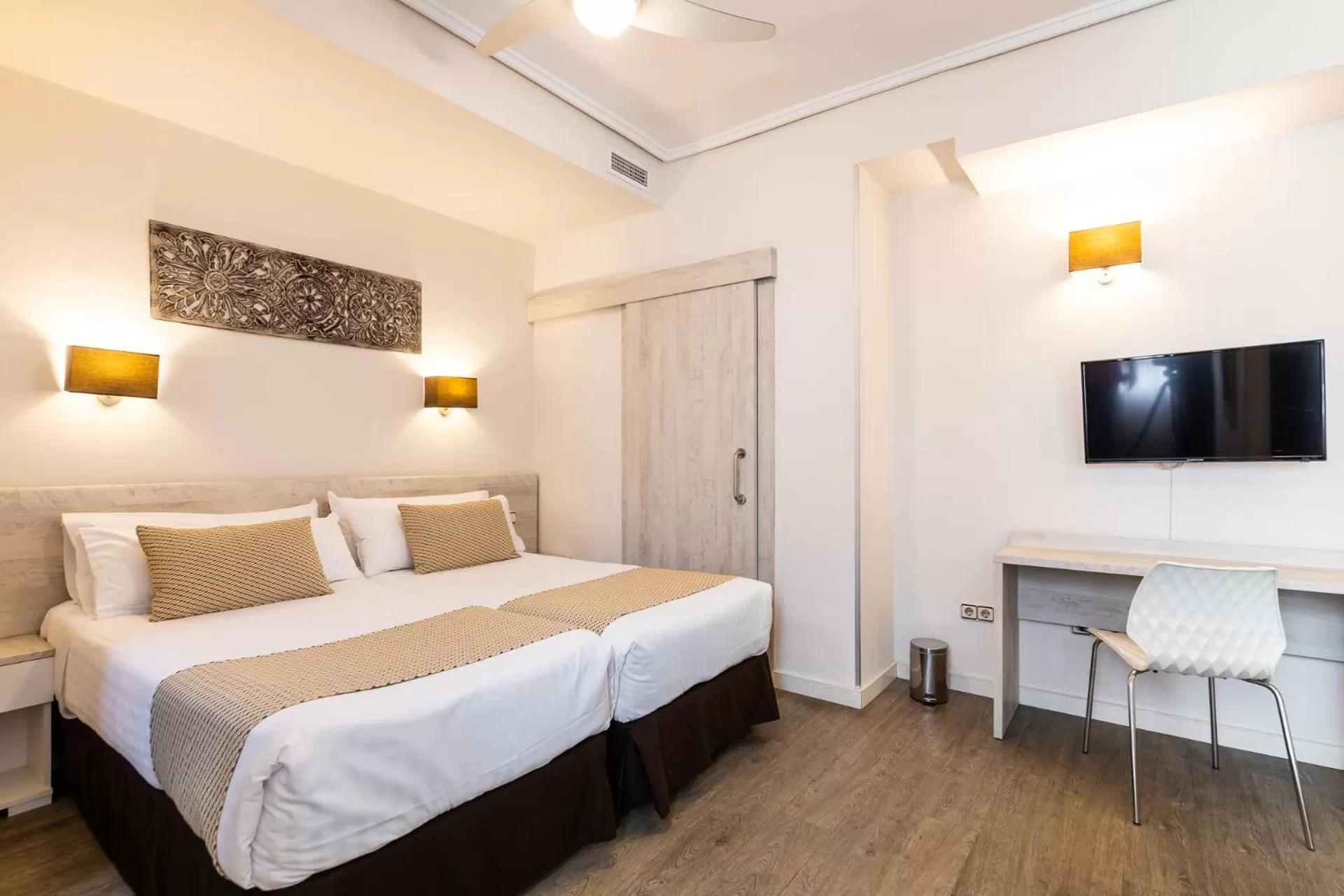 Bed in Sweet Hotel Continental