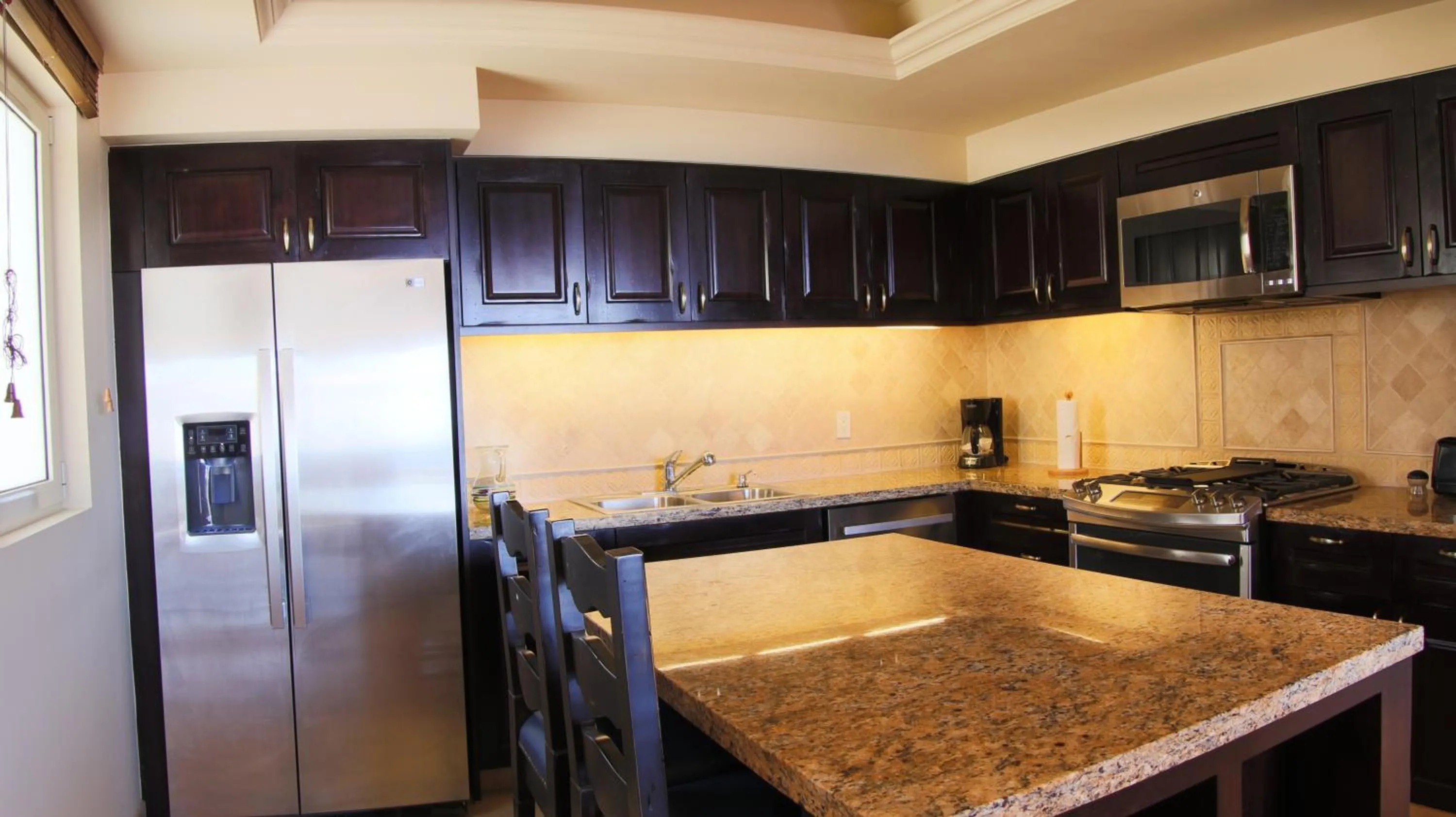 Kitchen or kitchenette in Montecristo Villas at Quivira Los Cabos -Vacation Rentals