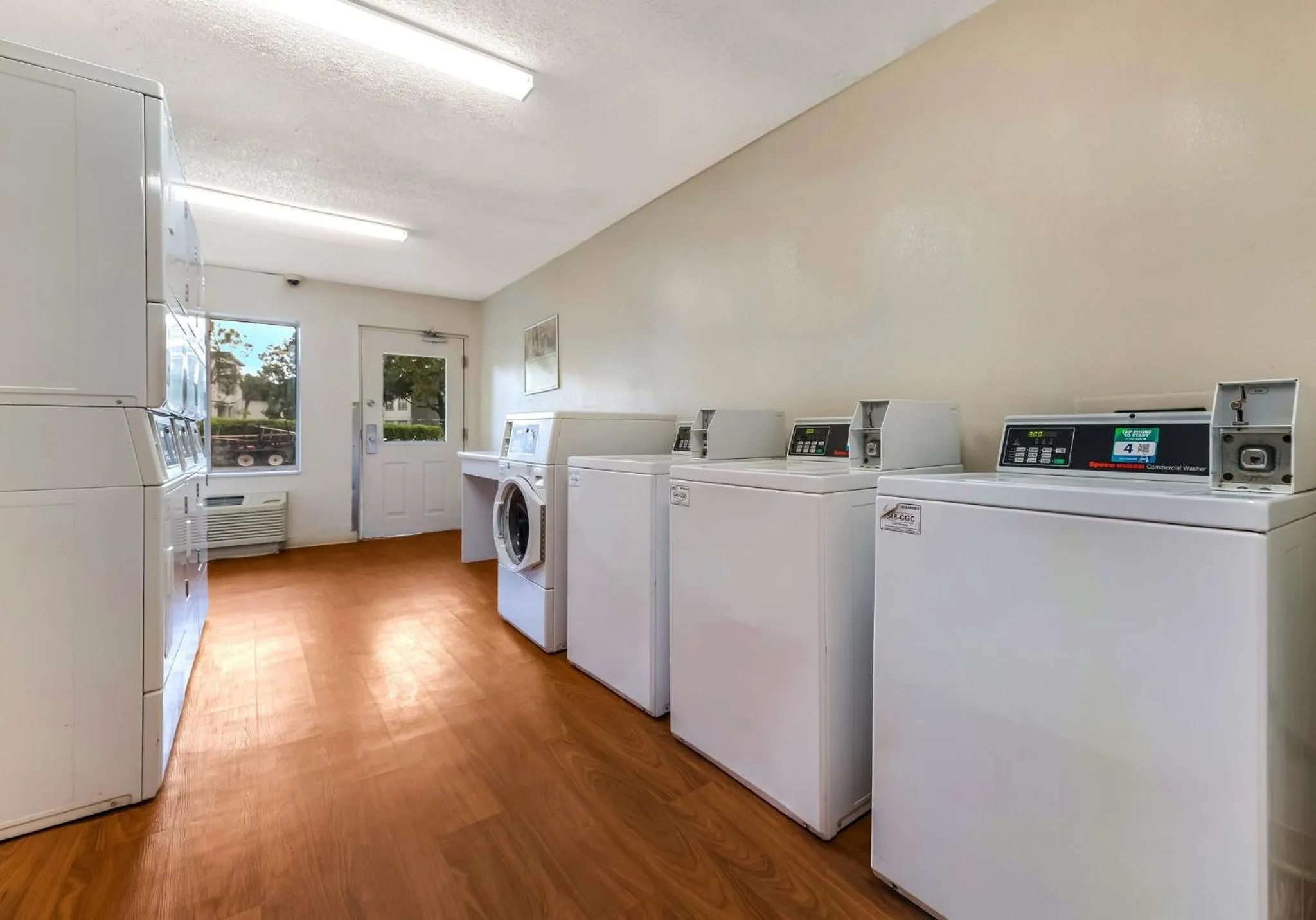 laundry in HomeTowne Studios by Red Roof Orlando - UCF Area
