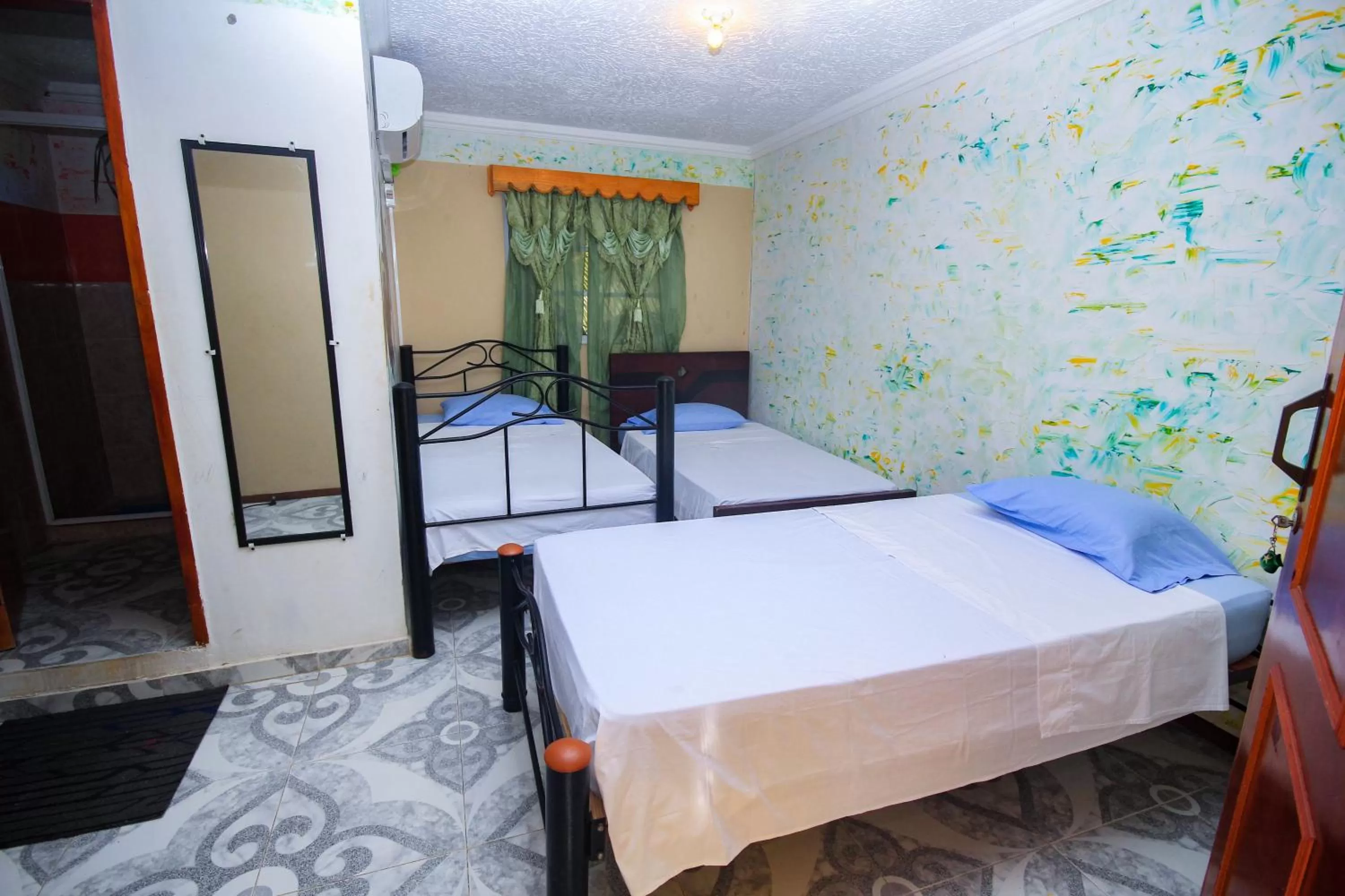 Bed in POSADA NATIVA DERMA´S INN