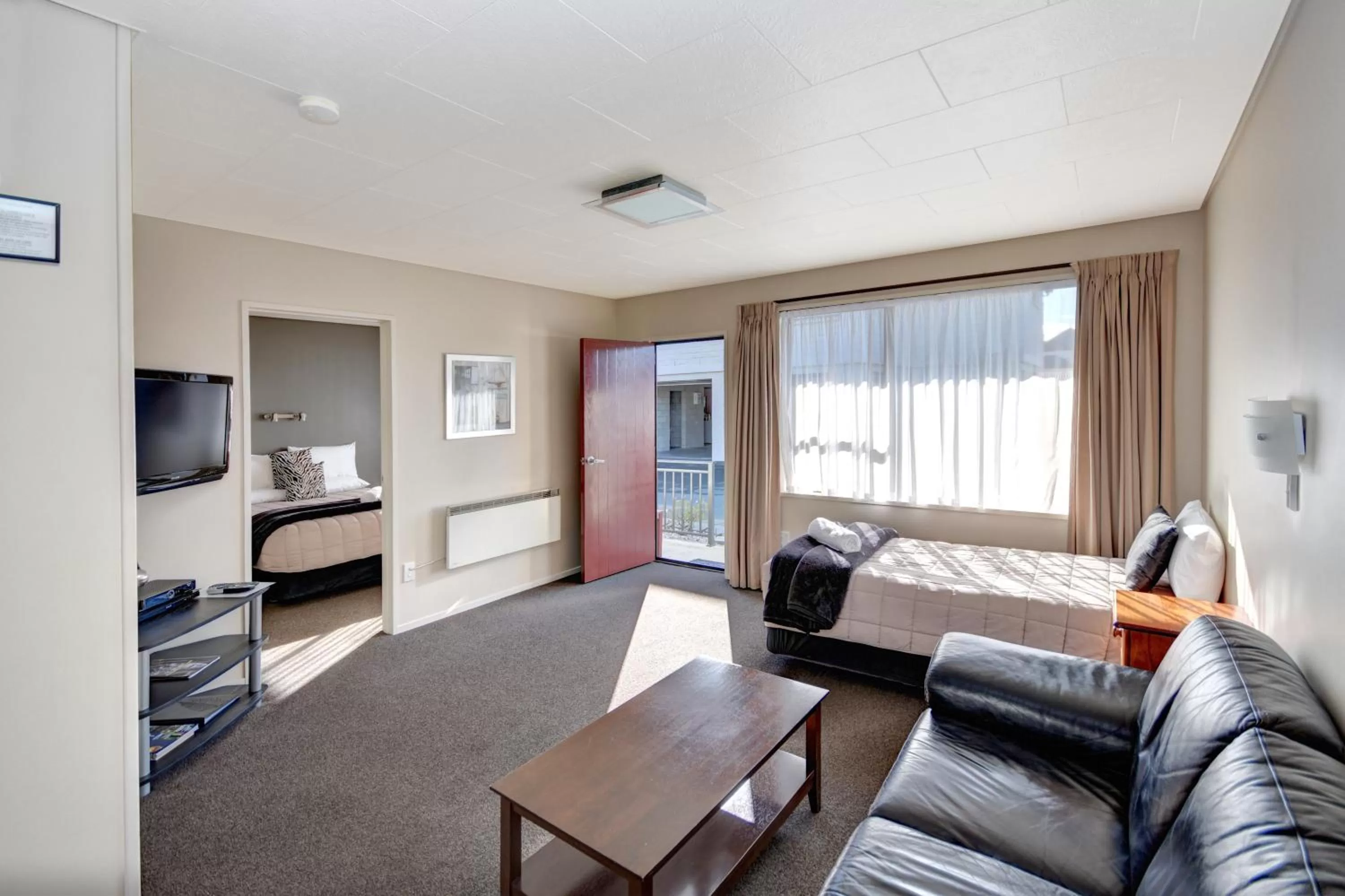 Bed in ASURE Adrian Motel